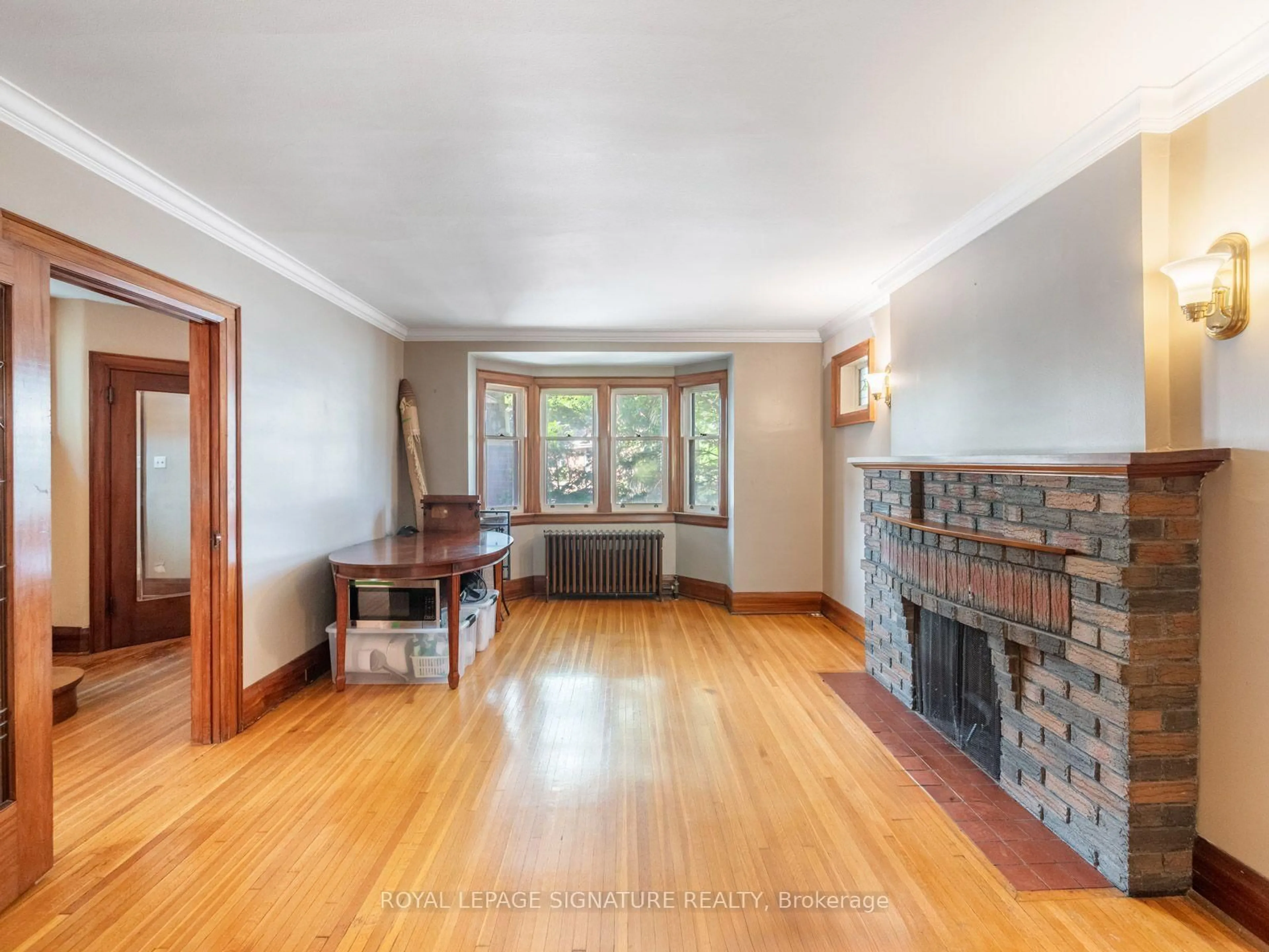 Living room with furniture, unknown for 511 Donlands Ave, Toronto Ontario M4J 3S4