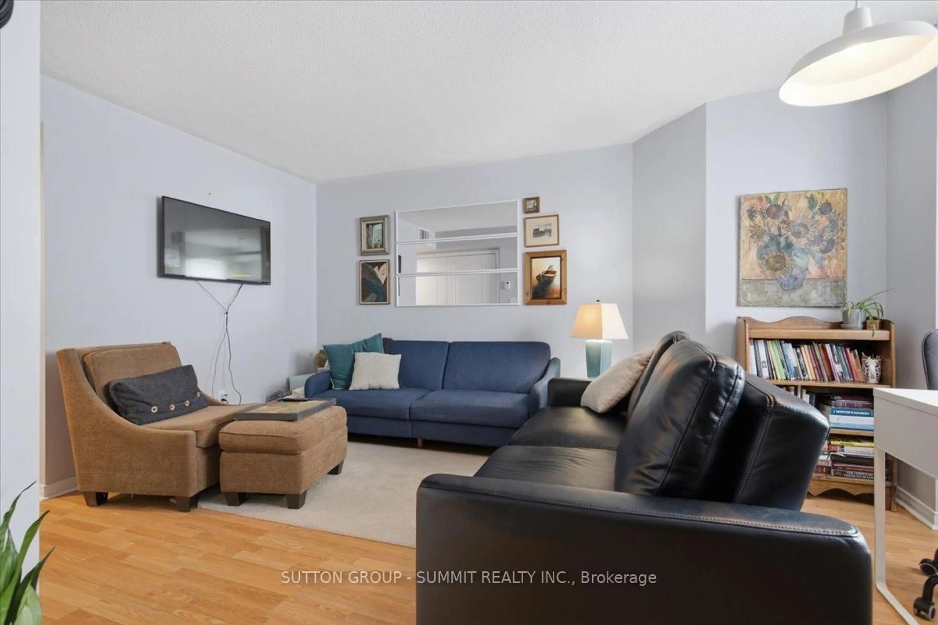 Living room with furniture, unknown for 25 Strangford Lane #201, Toronto Ontario M1L 0E5