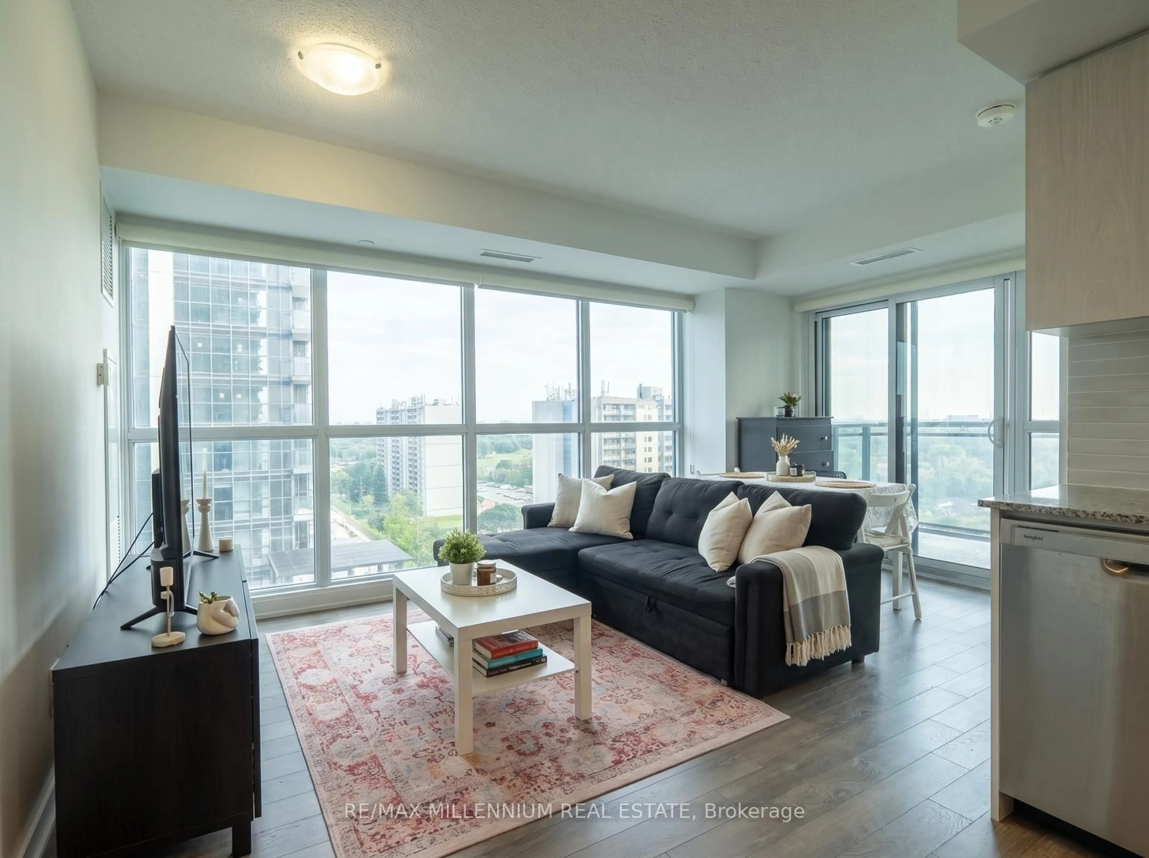 Living room with furniture, unknown for 20 Meadow Glen Pl #1206, Toronto Ontario M1G 0A9
