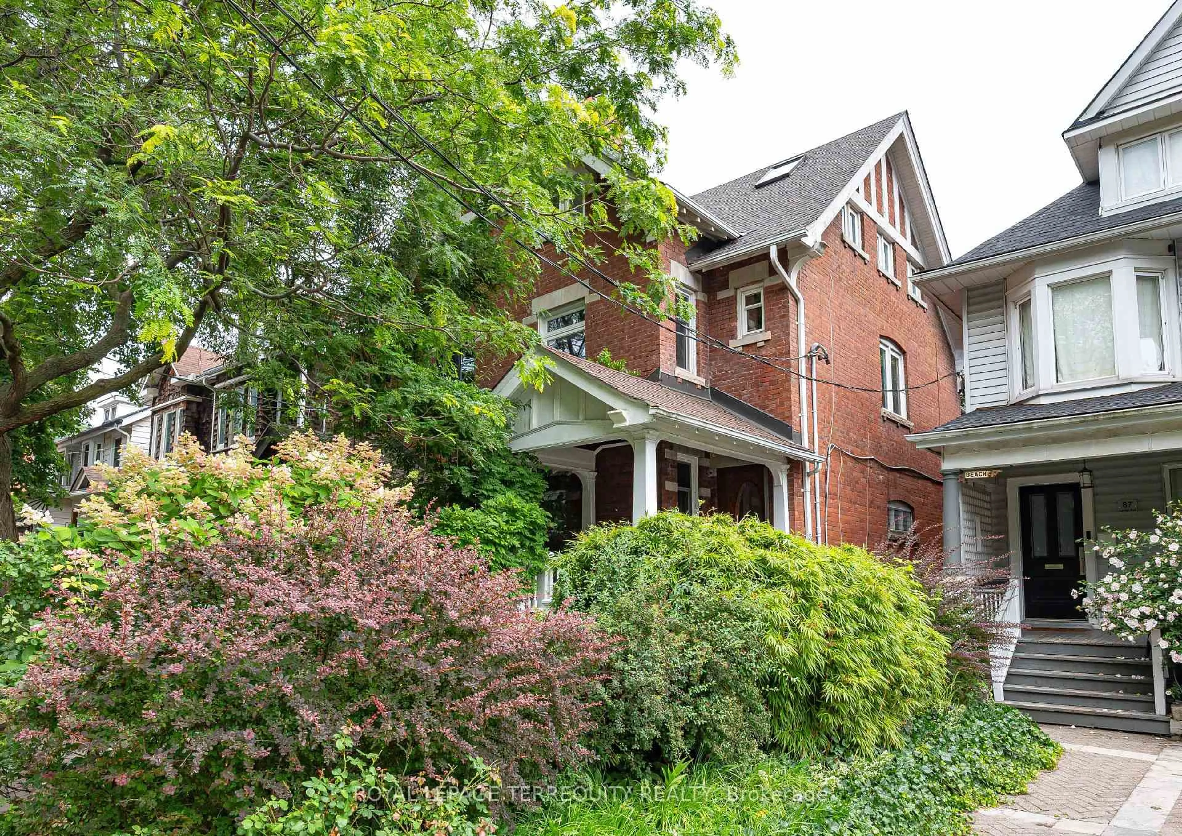 Home with brick exterior material, street for 89 Leuty Ave, Toronto Ontario M4E 2R2