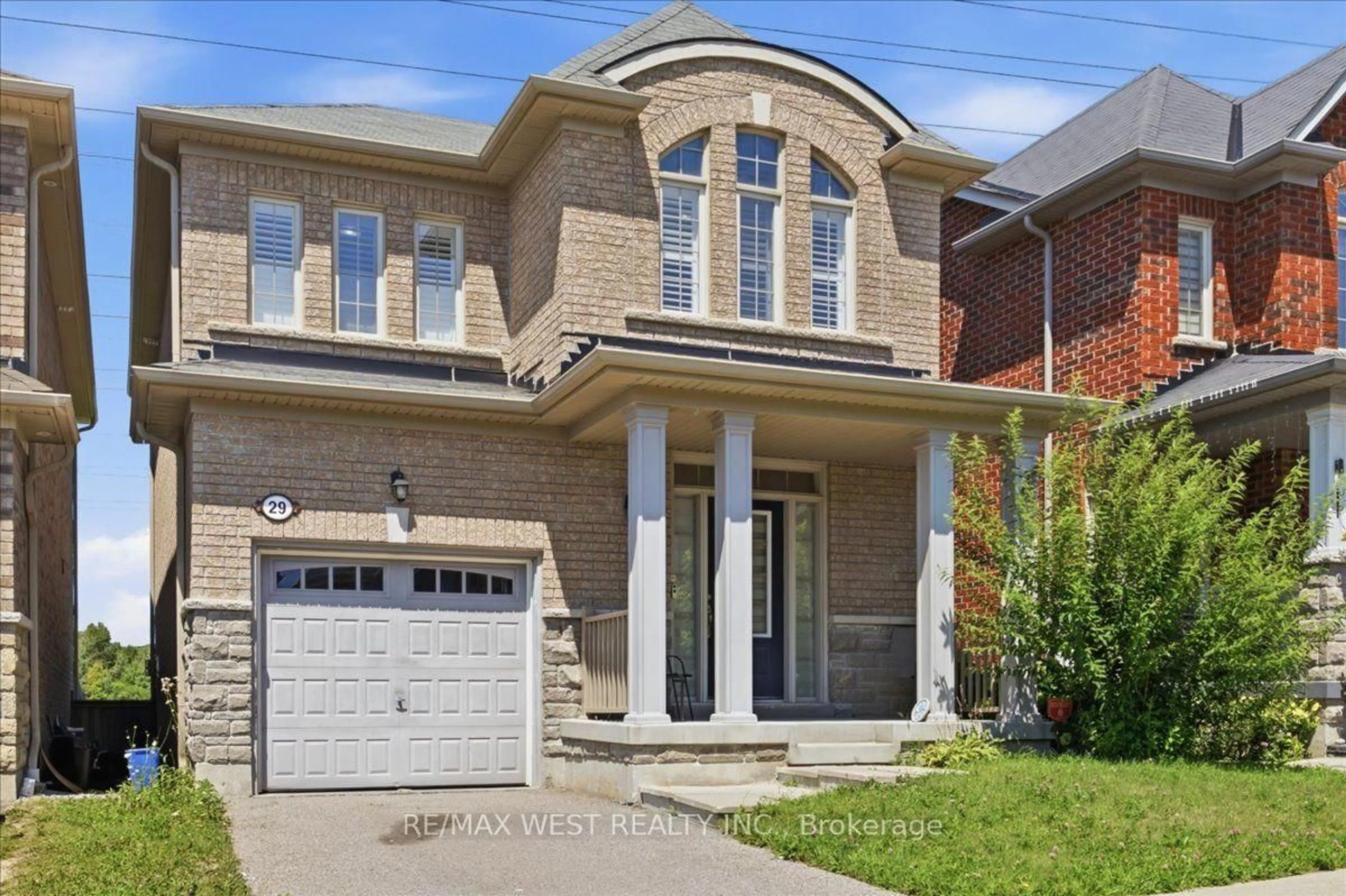 Home with brick exterior material, street for 29 Stockell Cres, Ajax Ontario L1T 0M4