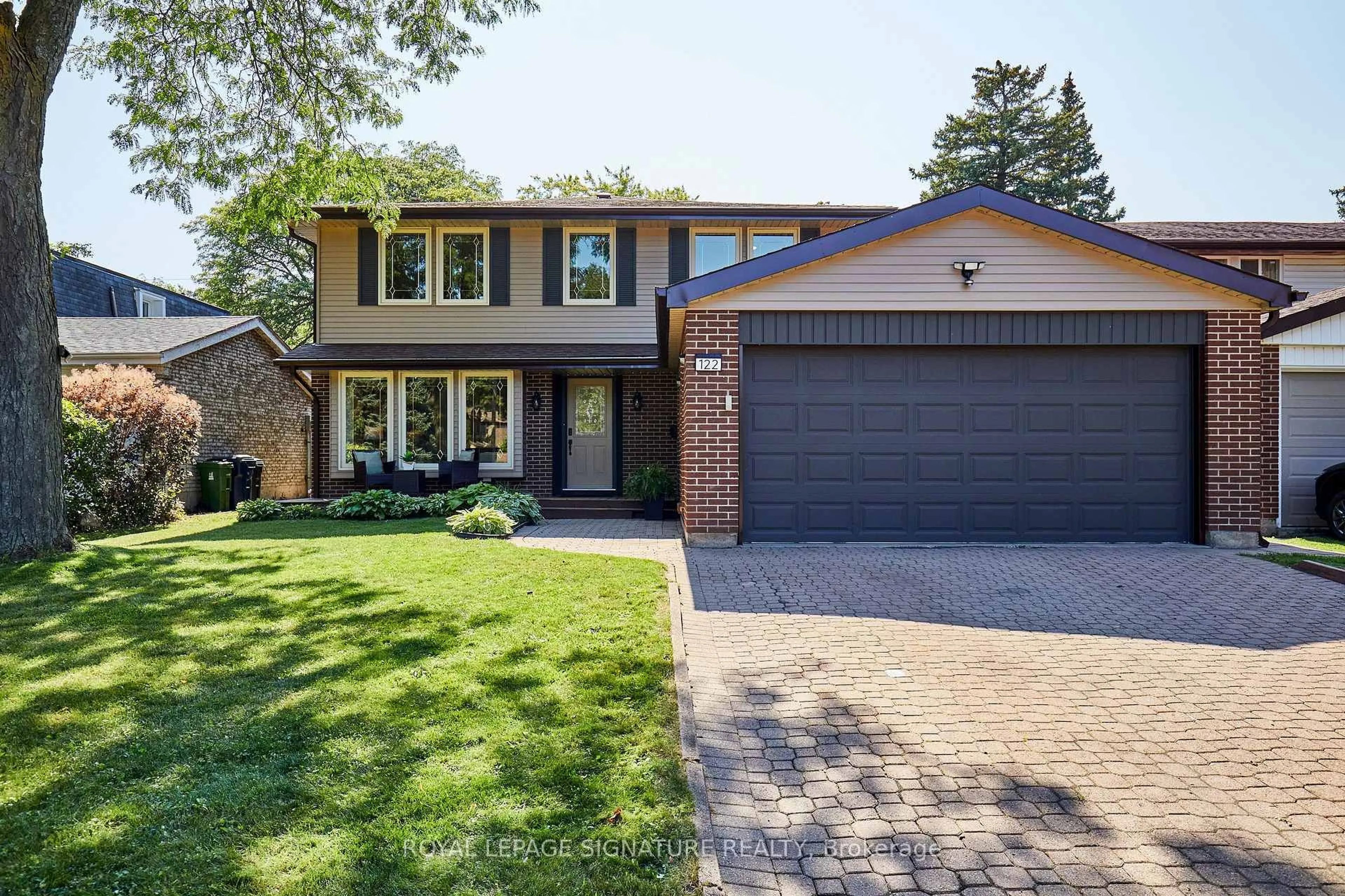 Home with brick exterior material, street for 122 Heatherside Dr, Toronto Ontario M1W 1T8