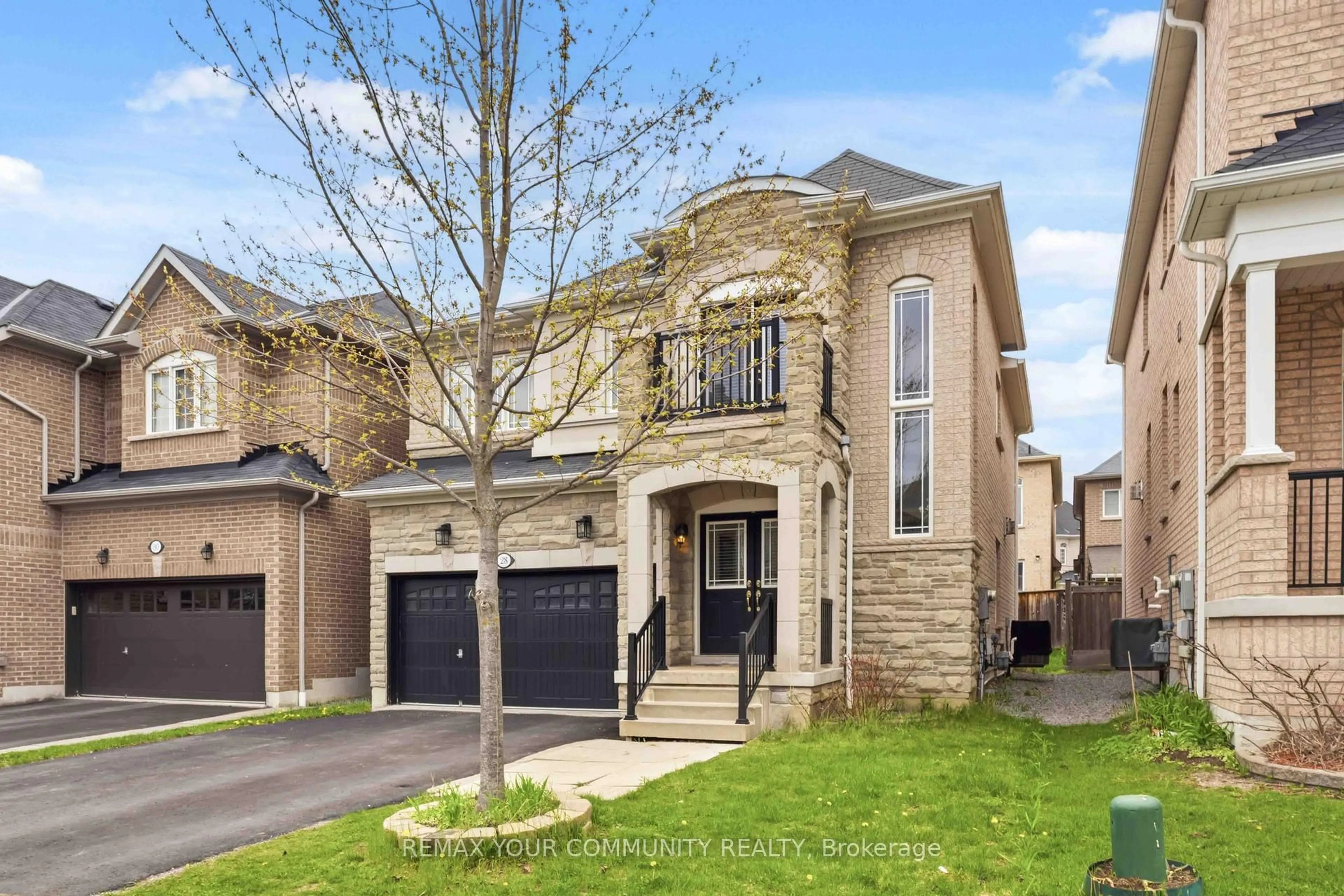 Home with brick exterior material, street for 28 Cater Ave, Ajax Ontario L1Z 0G1