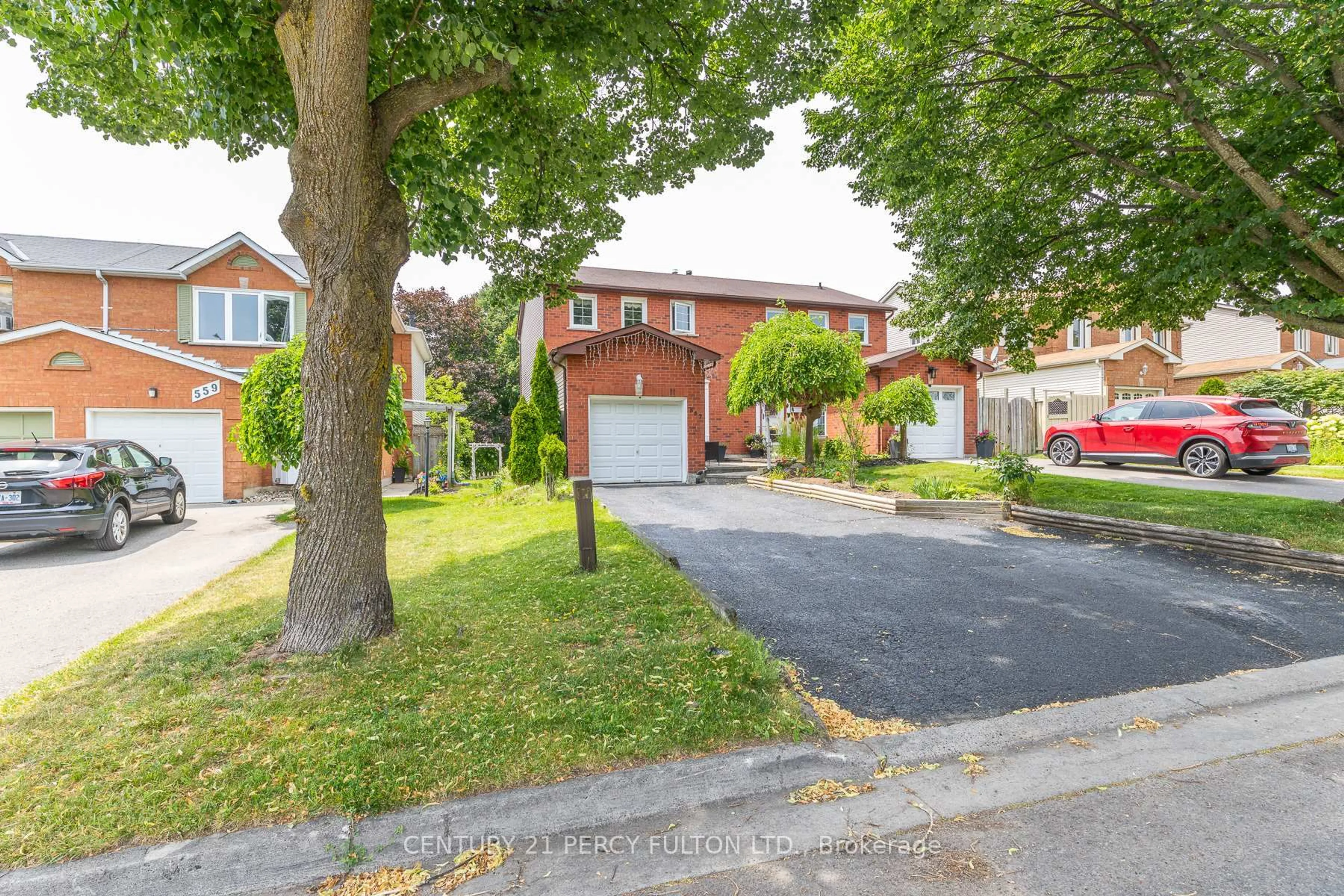 Home with brick exterior material, street for 557 Cobblehill Dr, Oshawa Ontario L1K 1Y6