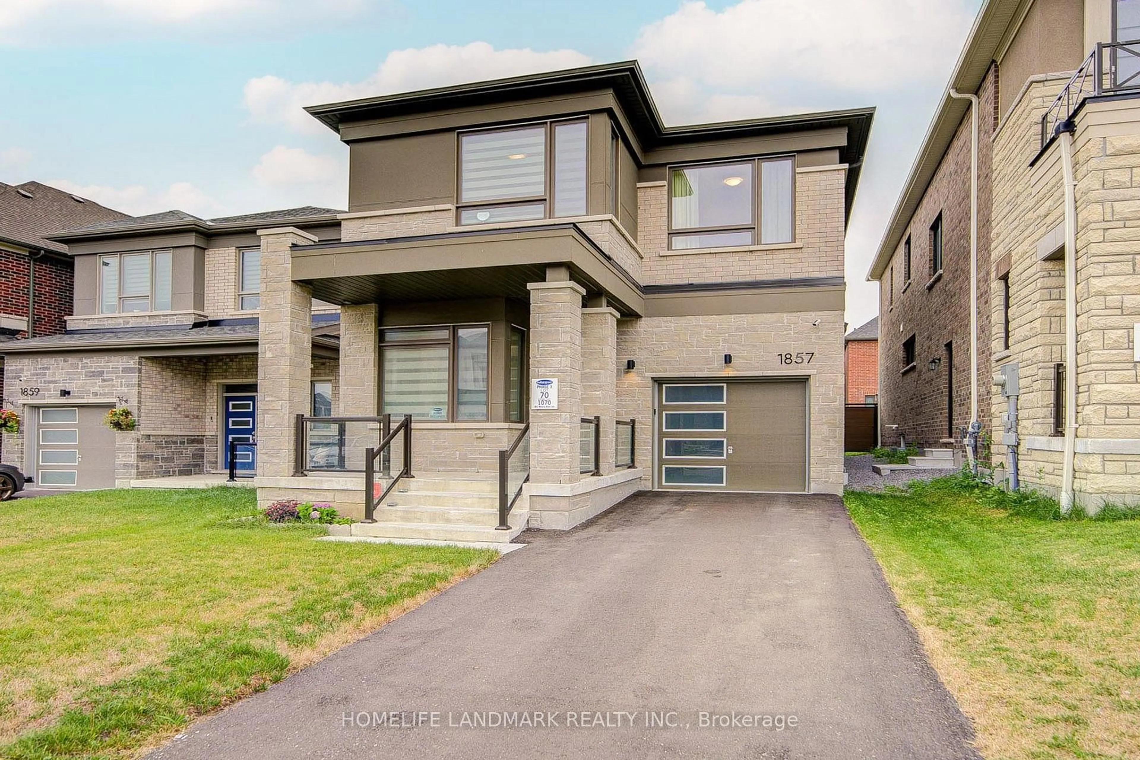 Home with brick exterior material, street for 1857 Weeping Willow Lane, Pickering Ontario L1Y 0B5