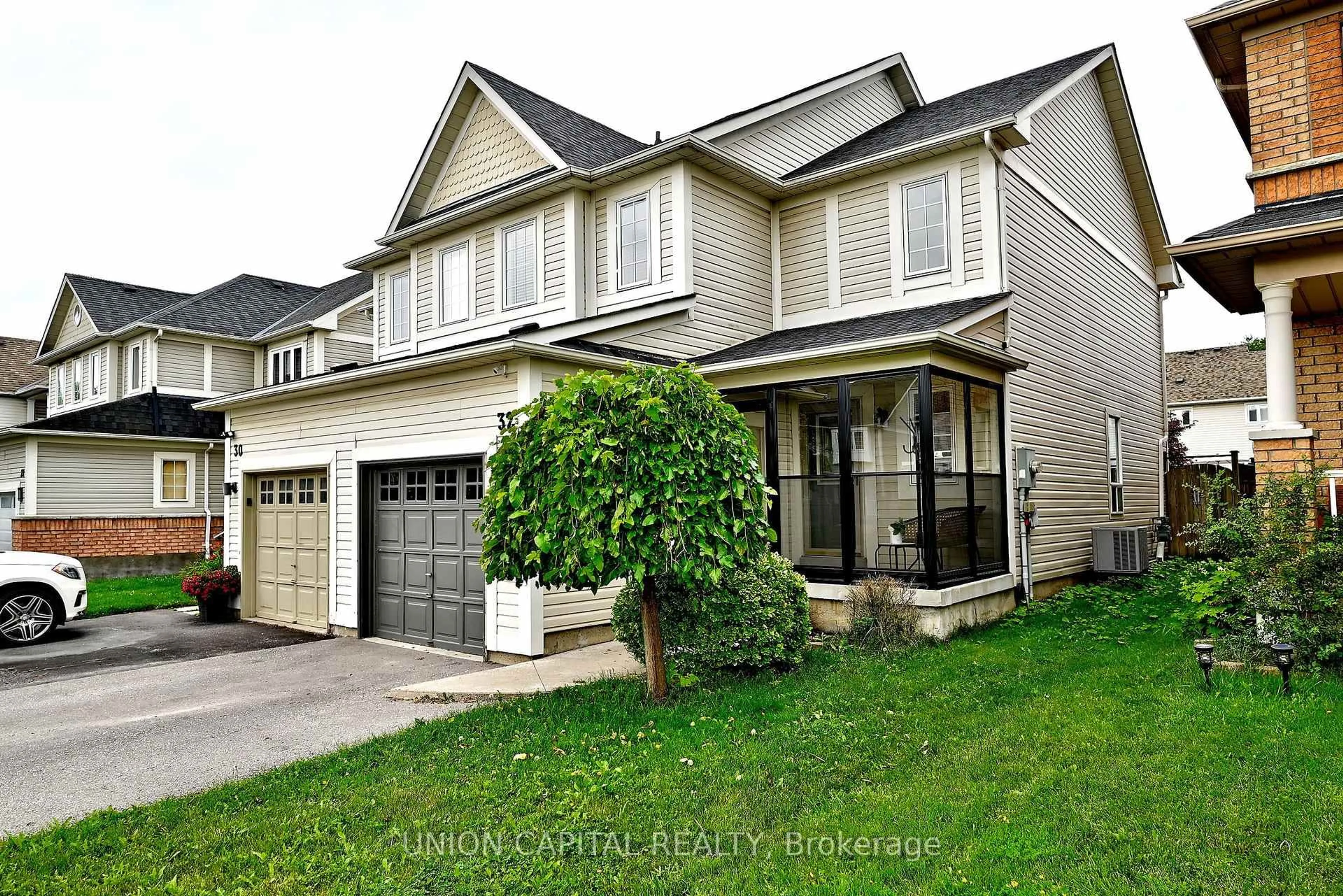 Home with vinyl exterior material, street for 32 Regatta Cres, Whitby Ontario L1N 9V2