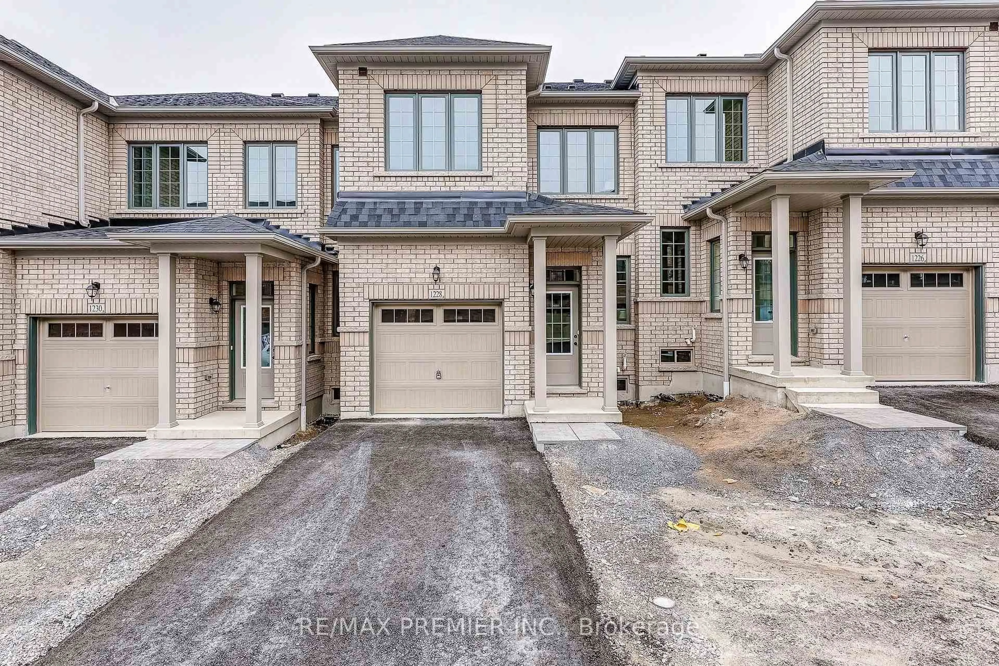 Home with brick exterior material, street for 1228 Elizabeth Mackenzie Dr, Pickering Ontario L1X 0S3