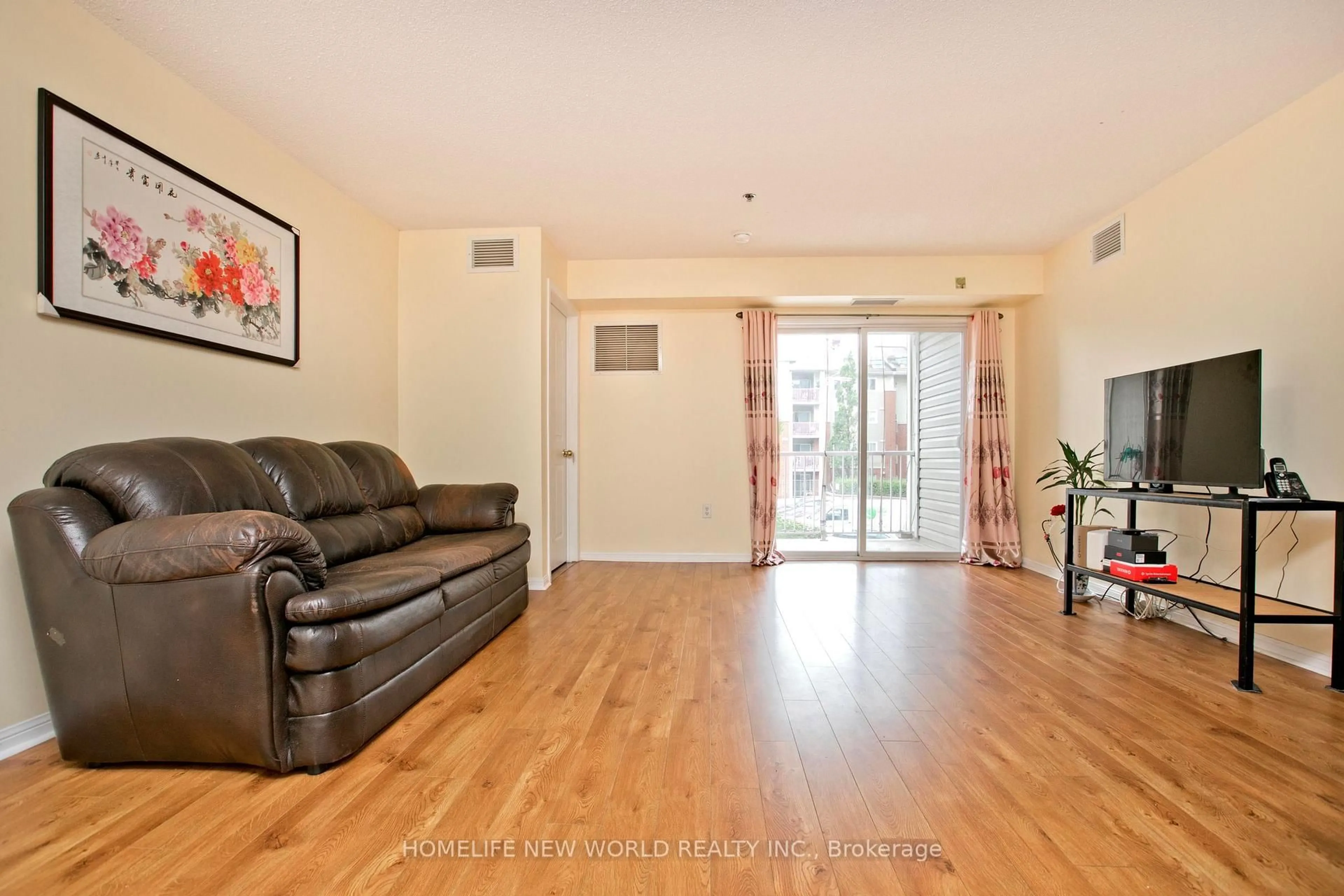 Living room with furniture, wood/laminate floor for 5225 Finch Ave #239, Toronto Ontario M1S 5W8