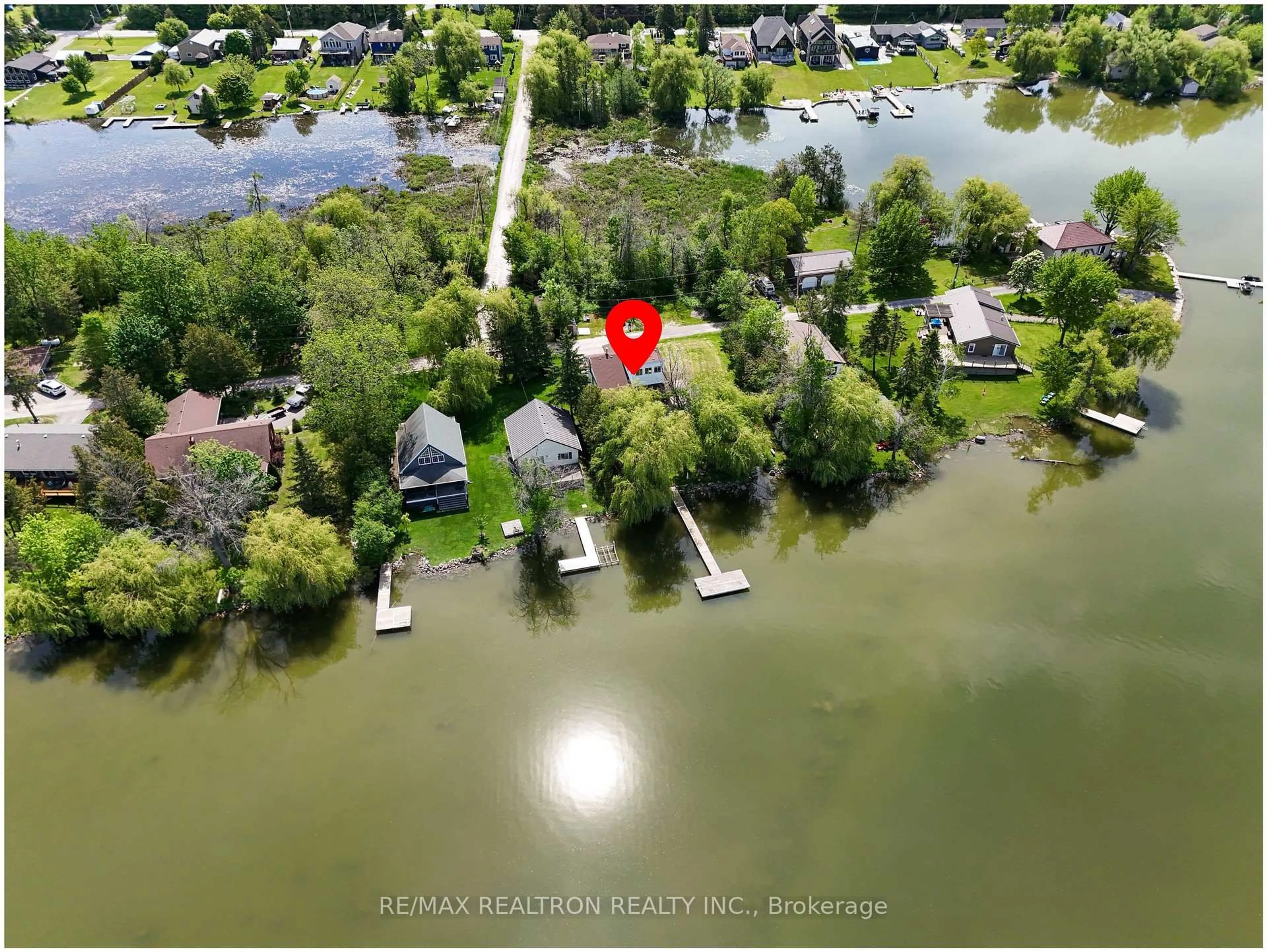 A pic from outside/outdoor area/front of a property/back of a property/a pic from drone, water/lake/river/ocean view for 16 Birch Island Rd, Scugog Ontario L0B 1K0