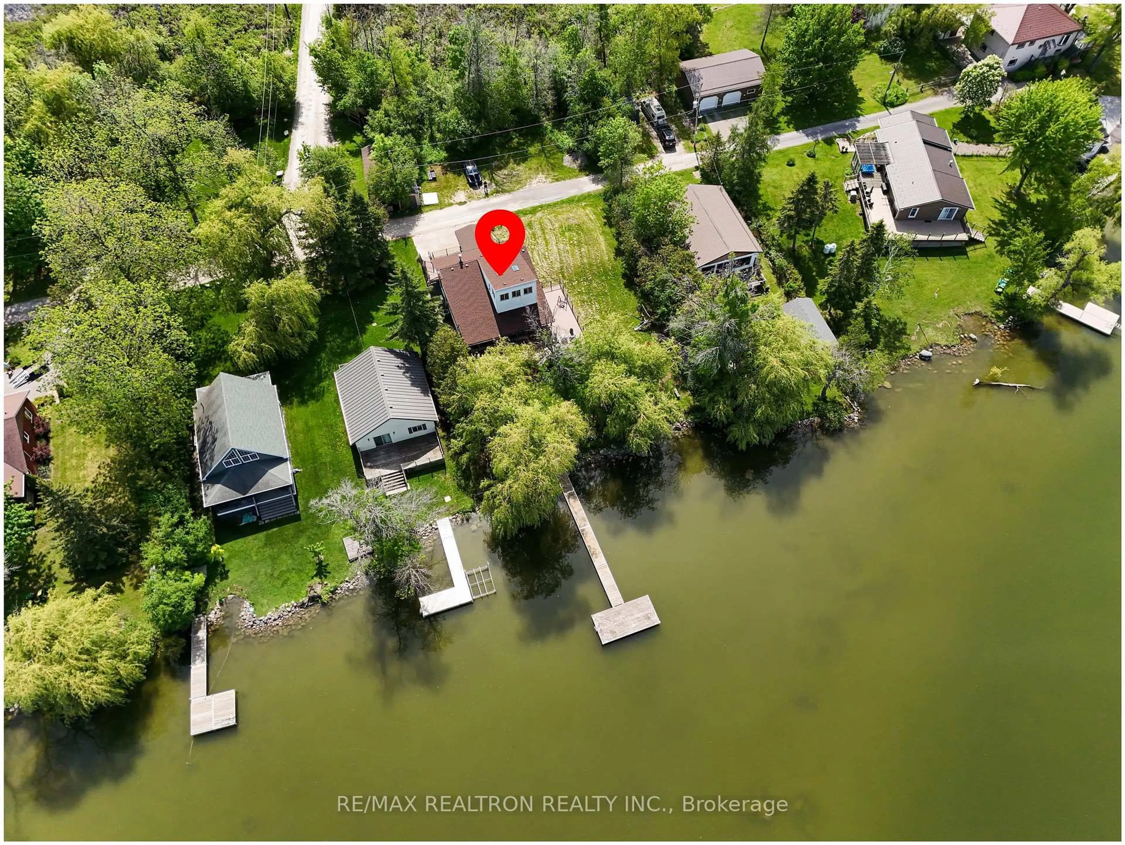 A pic from outside/outdoor area/front of a property/back of a property/a pic from drone, water/lake/river/ocean view for 16 Birch Island Rd, Scugog Ontario L0B 1K0
