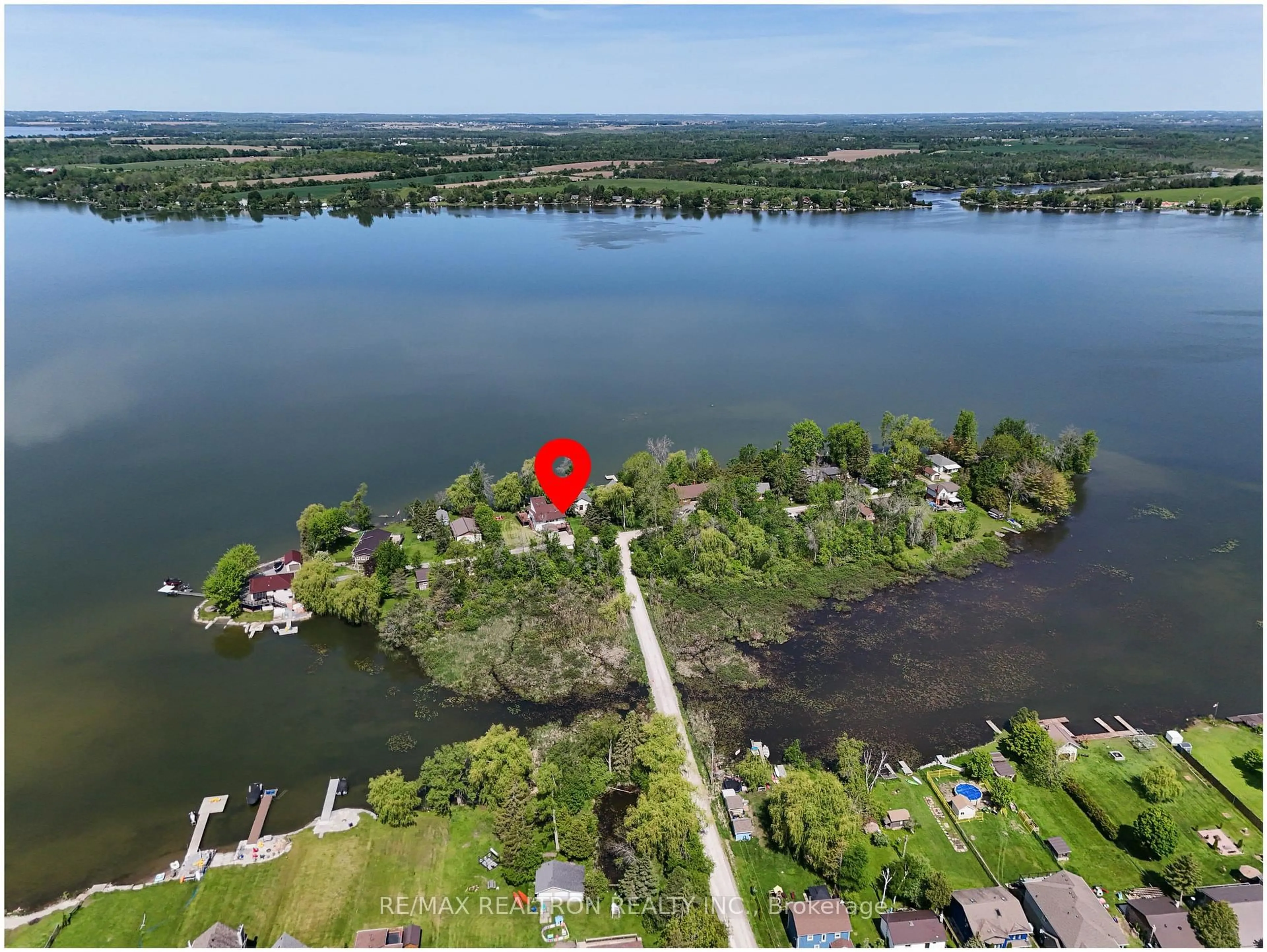 A pic from outside/outdoor area/front of a property/back of a property/a pic from drone, water/lake/river/ocean view for 16 Birch Island Rd, Scugog Ontario L0B 1K0