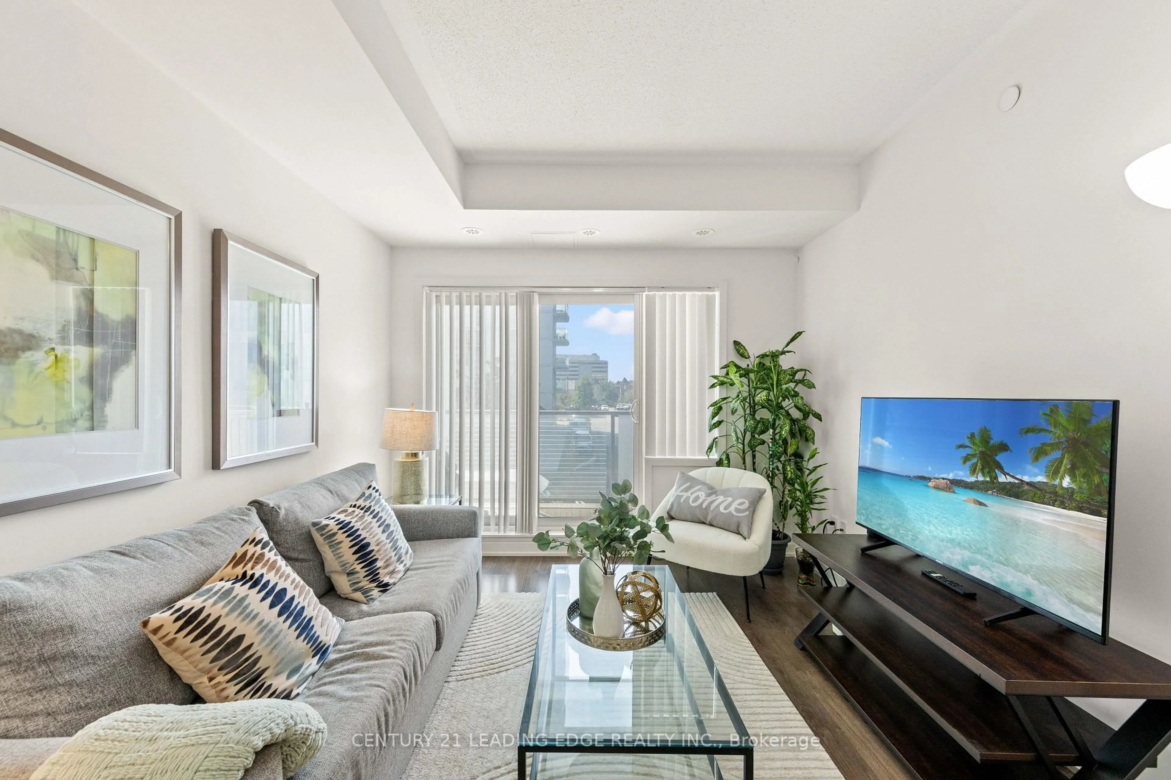 Living room with furniture, unknown for 20 Orchid Place Dr #207, Toronto Ontario M1B 0E1