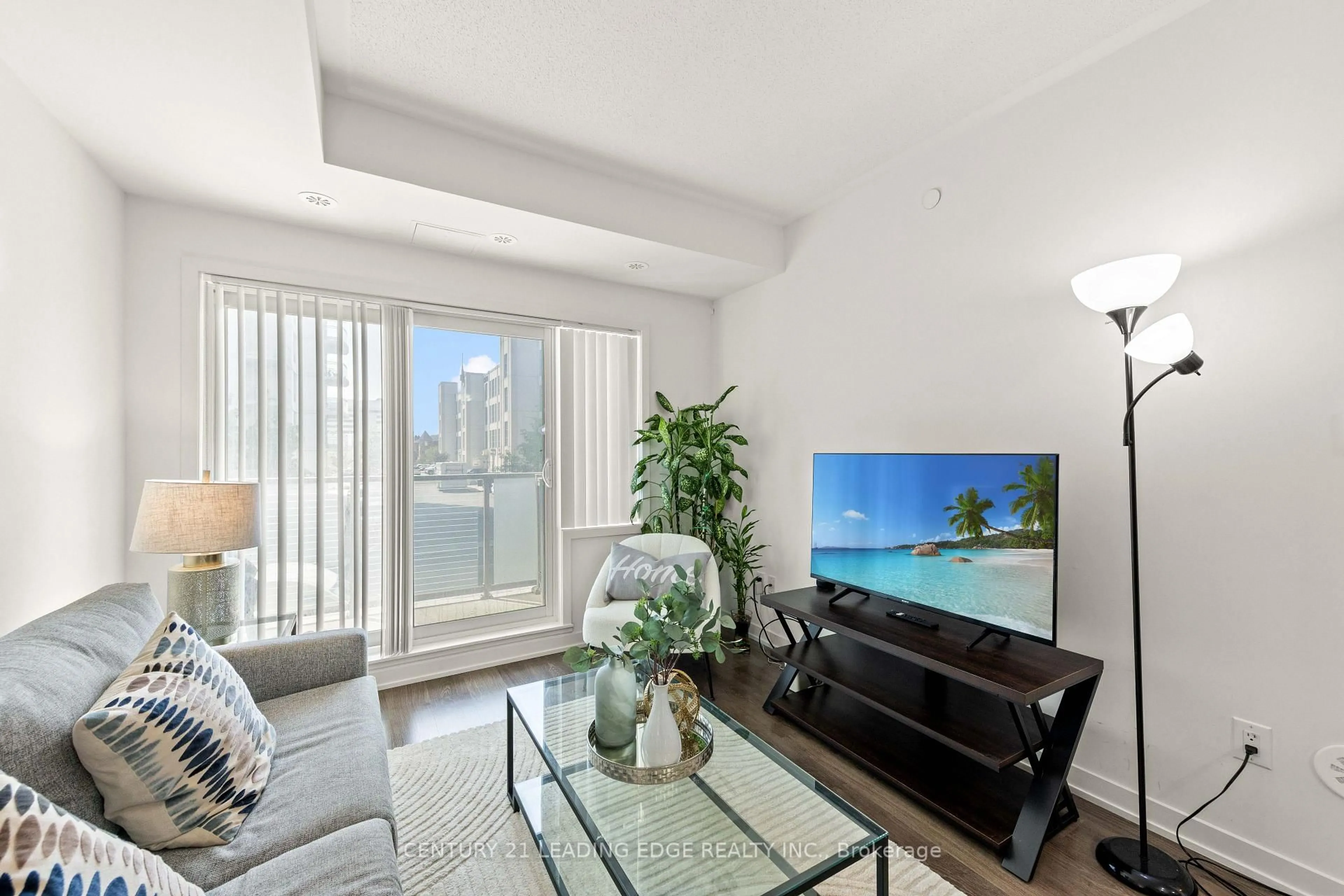 Living room with furniture, unknown for 20 Orchid Place Dr #207, Toronto Ontario M1B 0E1