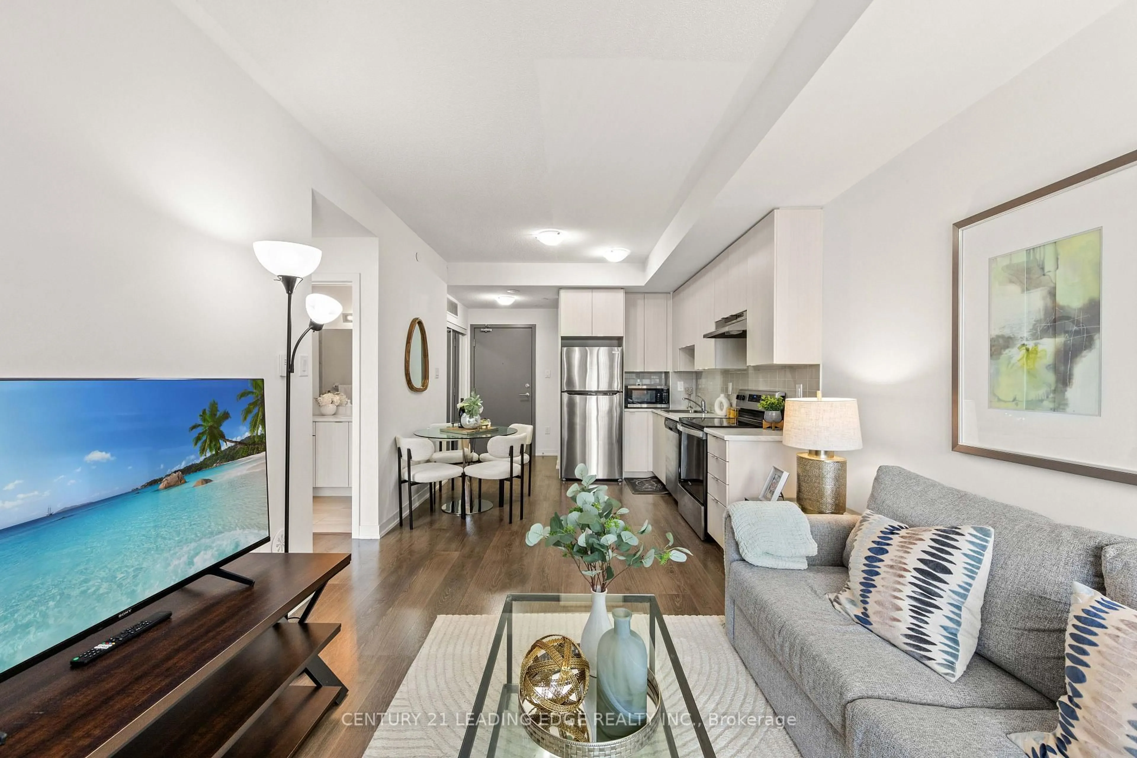 Living room with furniture, unknown for 20 Orchid Place Dr #207, Toronto Ontario M1B 0E1
