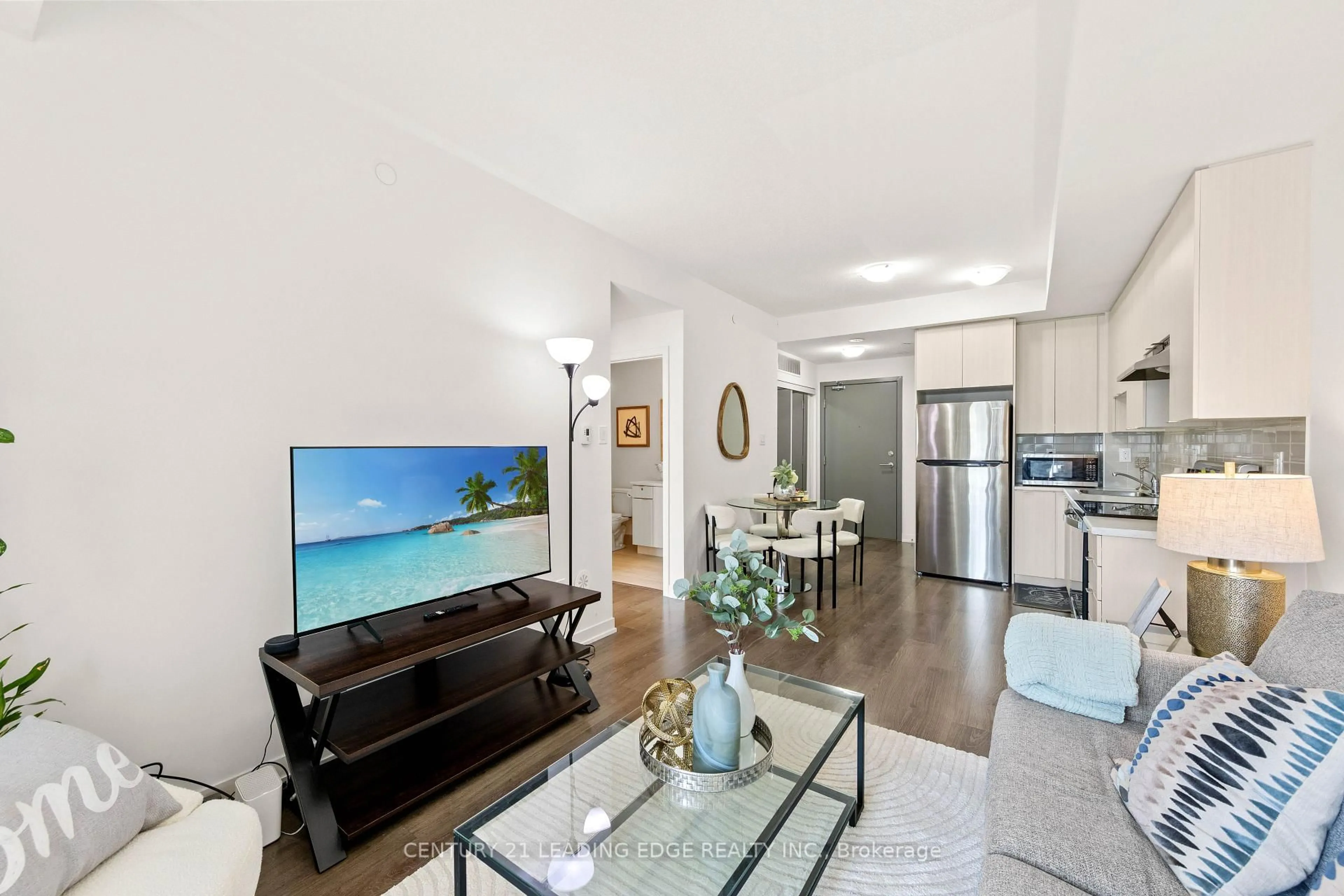 Living room with furniture, unknown for 20 Orchid Place Dr #207, Toronto Ontario M1B 0E1