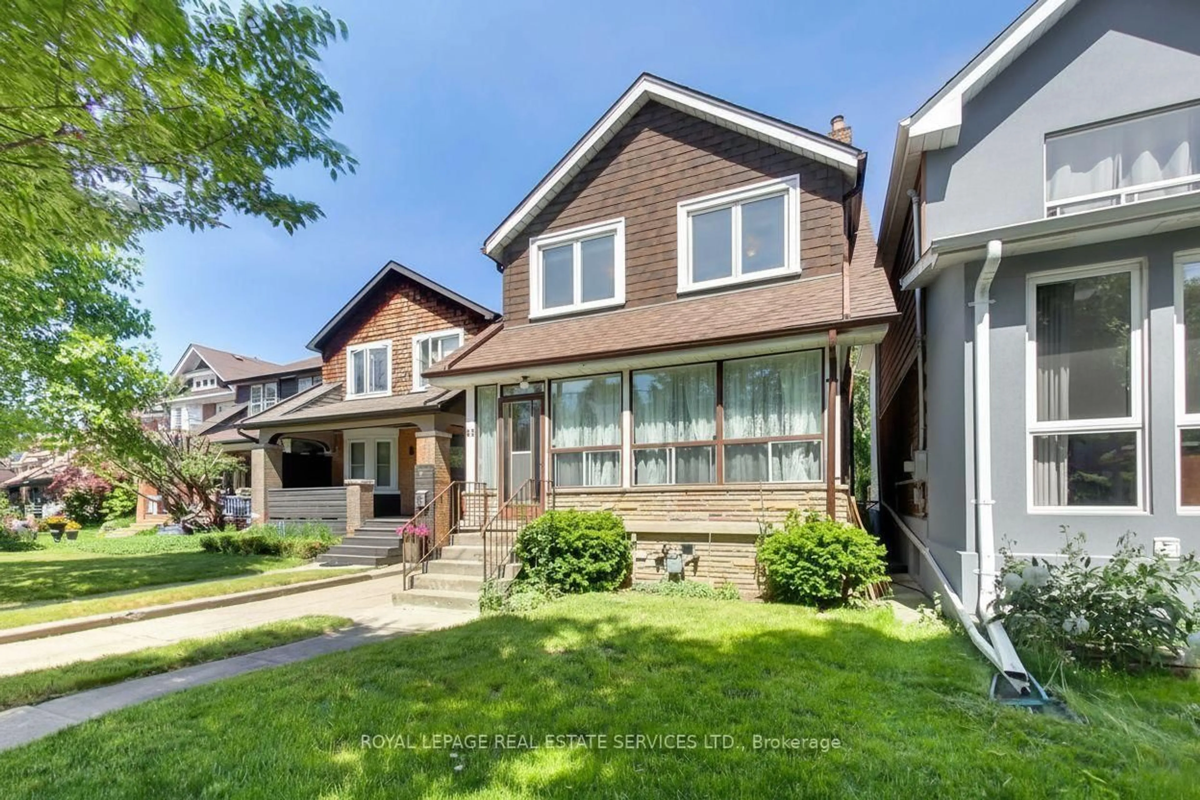 Home with brick exterior material, street for 85 Dawes Rd, Toronto Ontario M4C 5B2