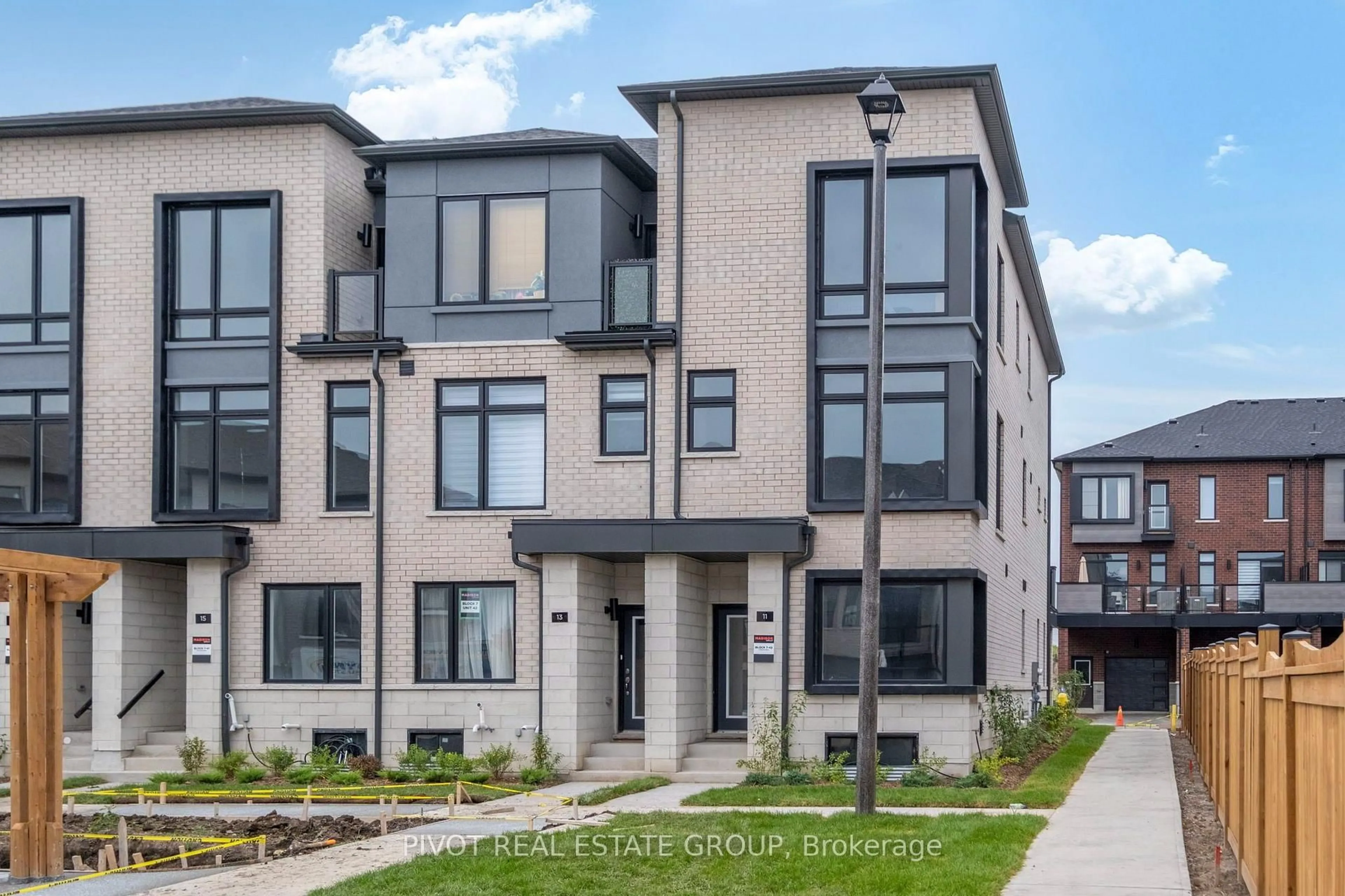 Home with brick exterior material, street for 11 Pluto Way, Whitby Ontario L1M 0M7
