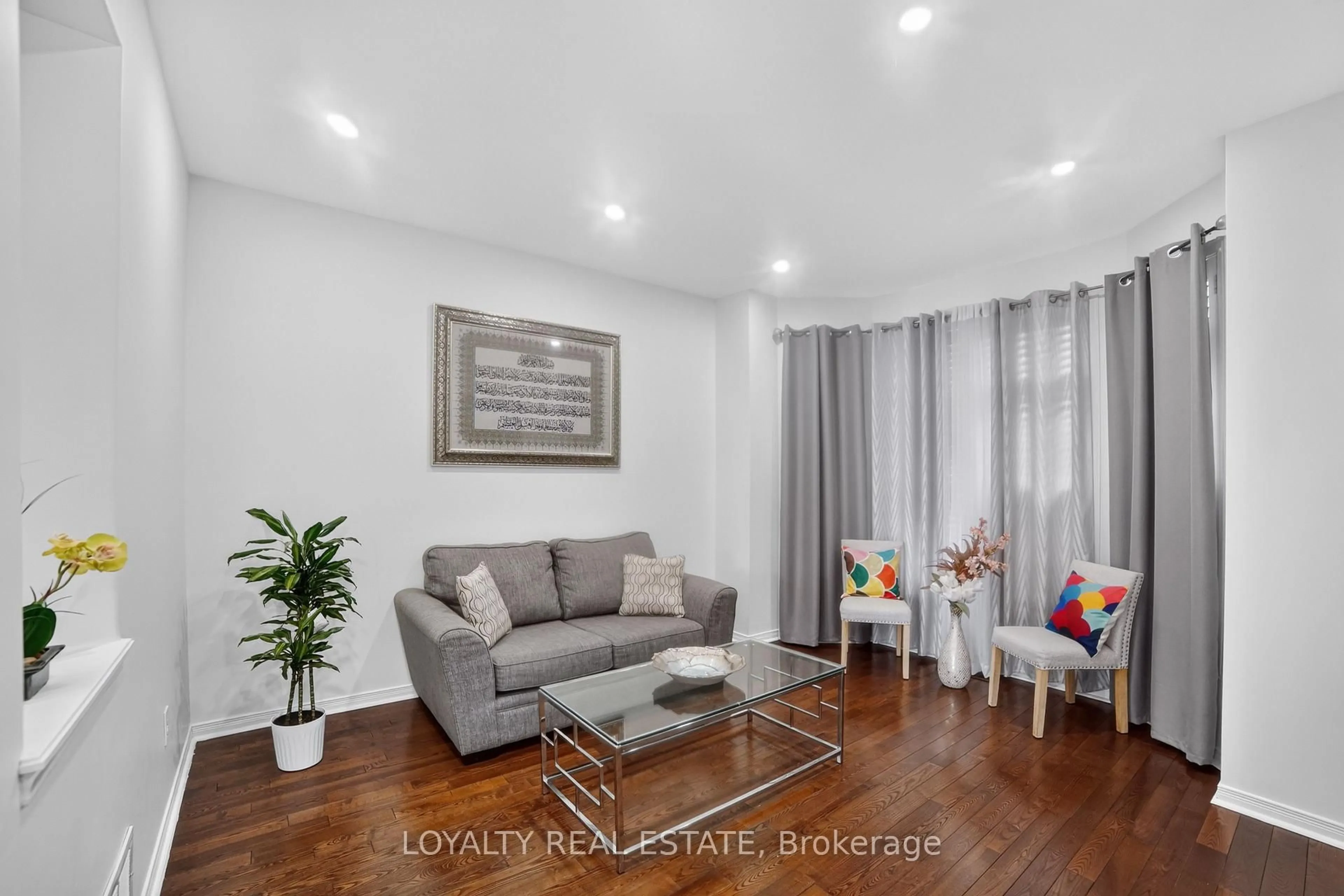 Living room with furniture, wood/laminate floor for 5 Southam St, Ajax Ontario L1Z 1R6
