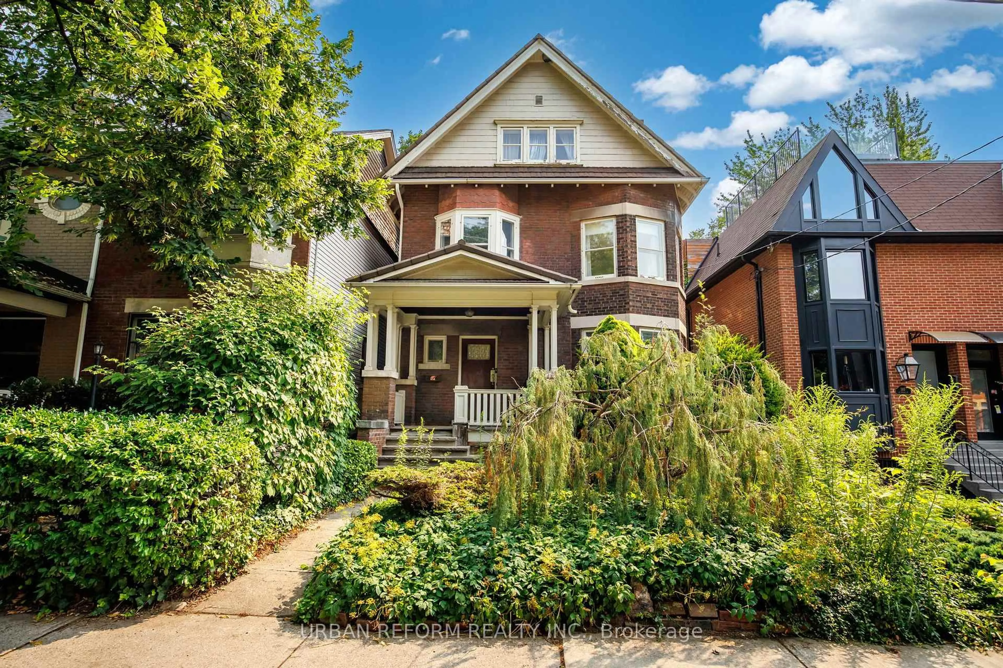 Home with brick exterior material, street for 197 De Grassi St, Toronto Ontario M4M 2K8