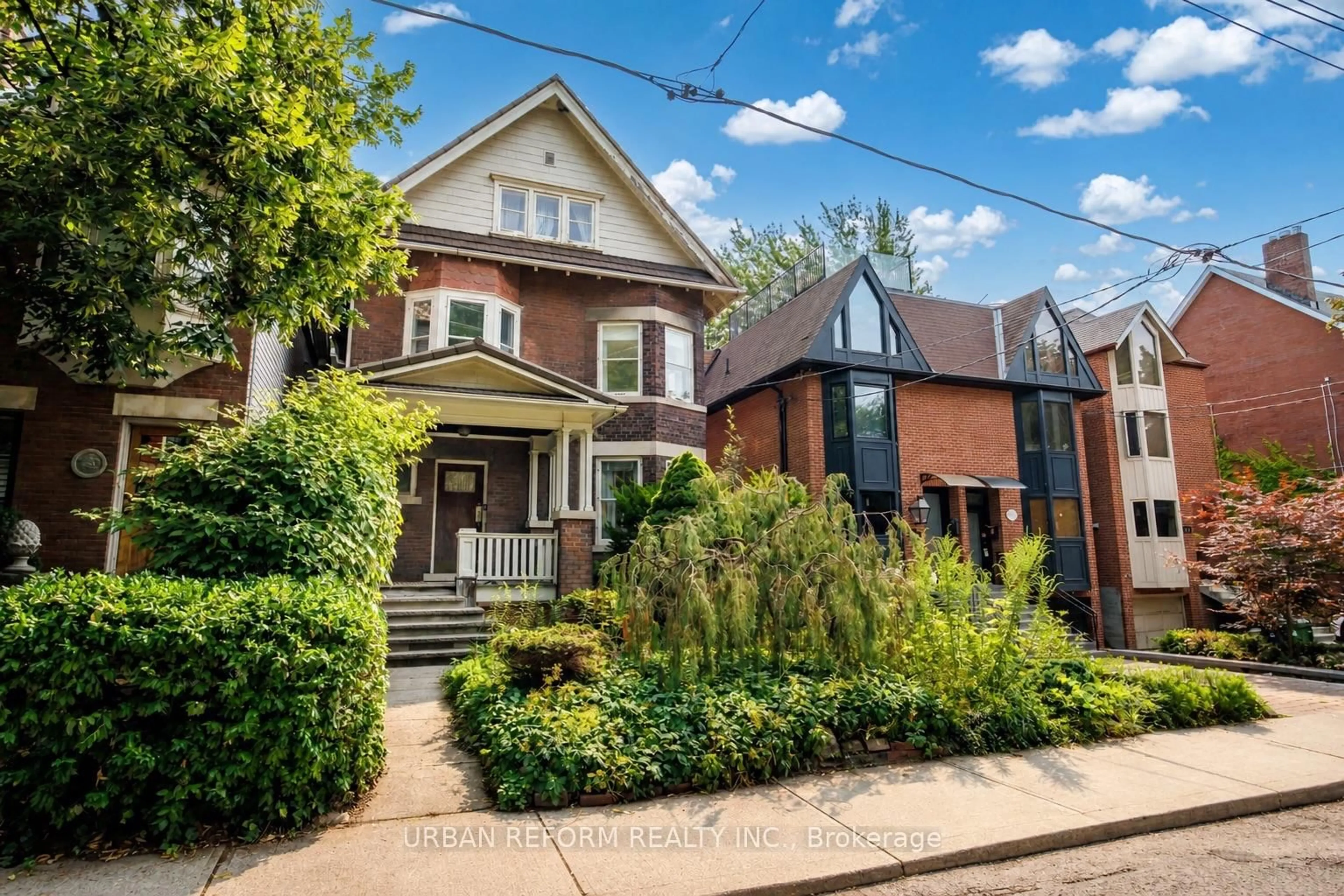 Home with brick exterior material, street for 197 De Grassi St, Toronto Ontario M4M 2K8