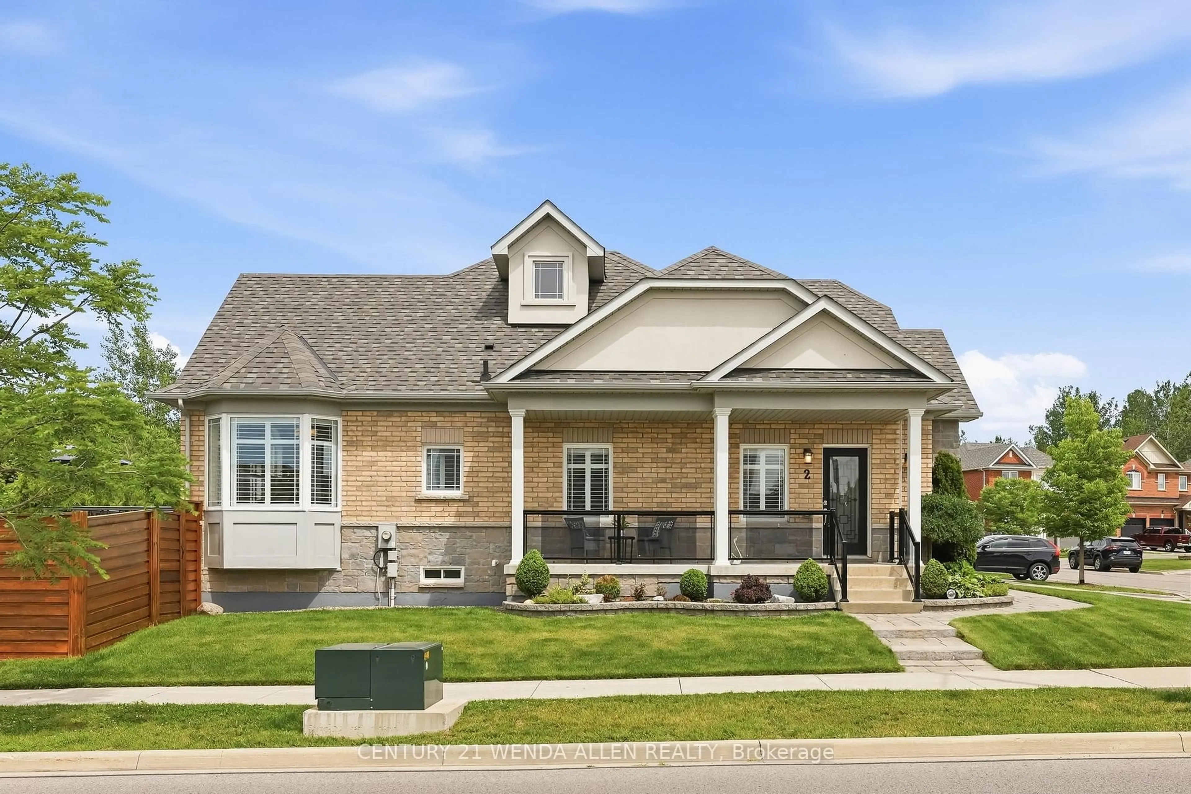 Home with brick exterior material, street for 2 Rushlands Cres, Whitby Ontario L1R 0M7