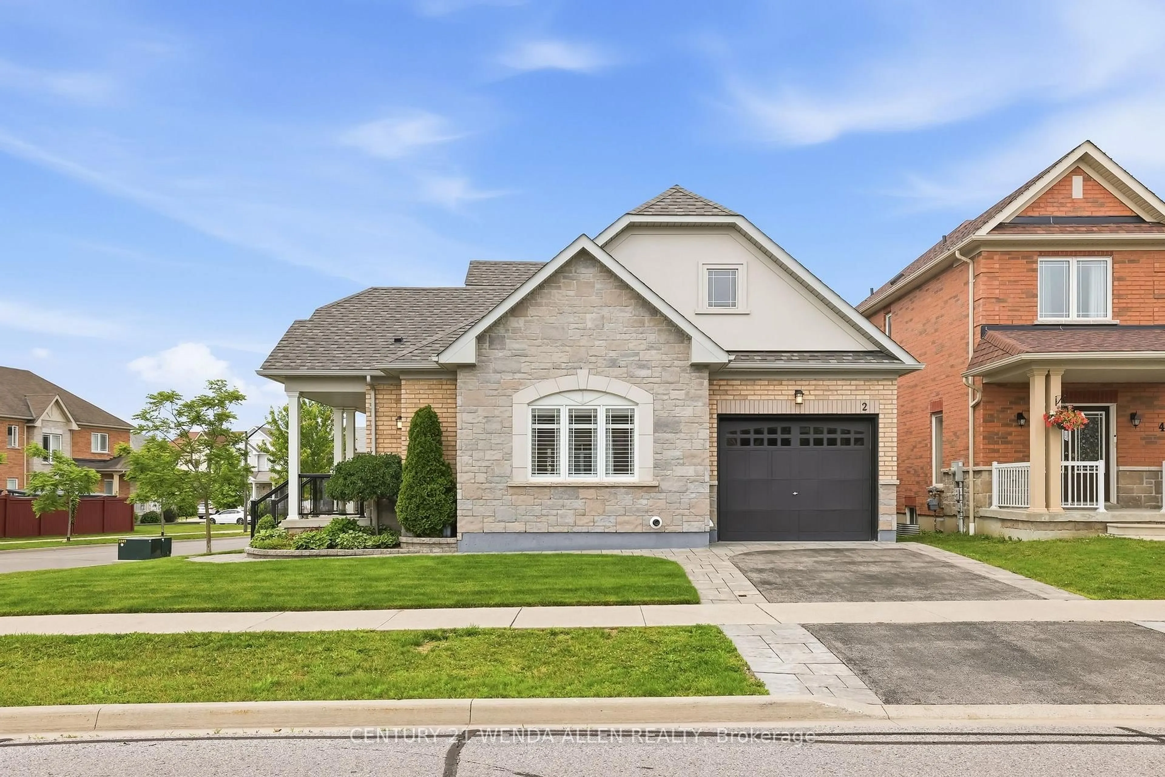 Home with brick exterior material, street for 2 Rushlands Cres, Whitby Ontario L1R 0M7