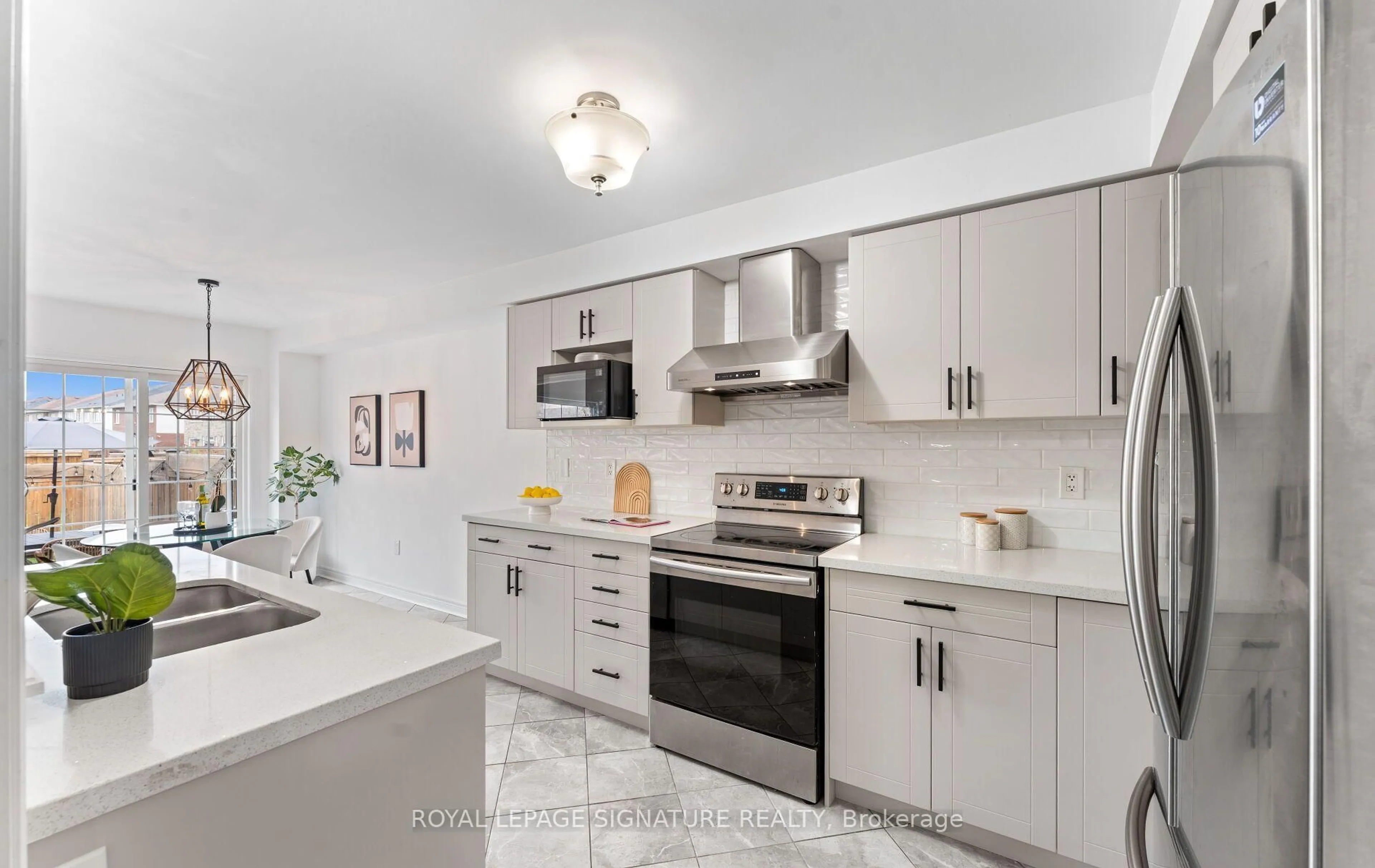 Open concept kitchen, ceramic/tile floor for 104 Whitefoot Cres, Ajax Ontario L1Z 2E3