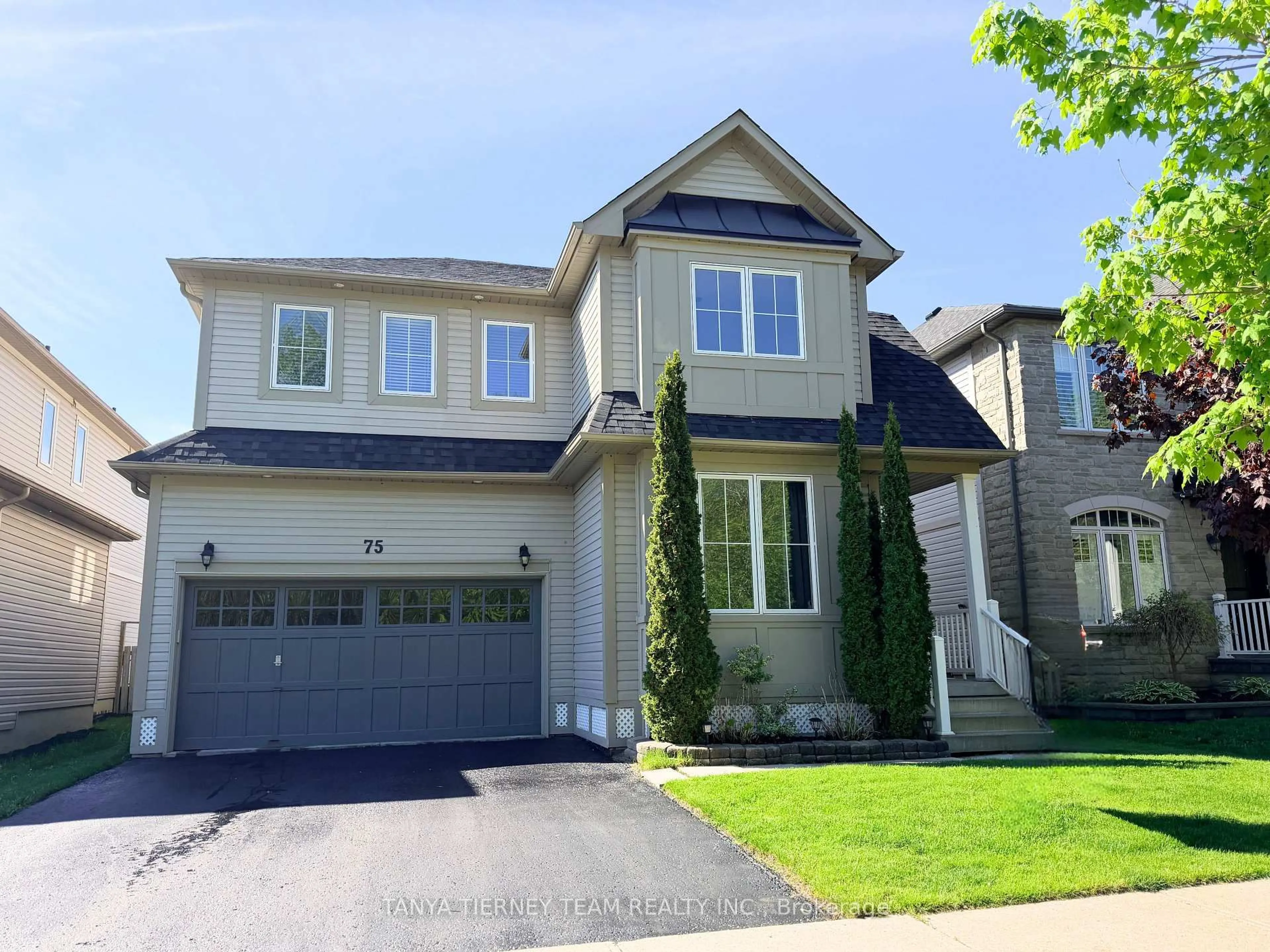 Home with vinyl exterior material, street for 75 Robert Attersley Dr, Whitby Ontario L1R 0B7