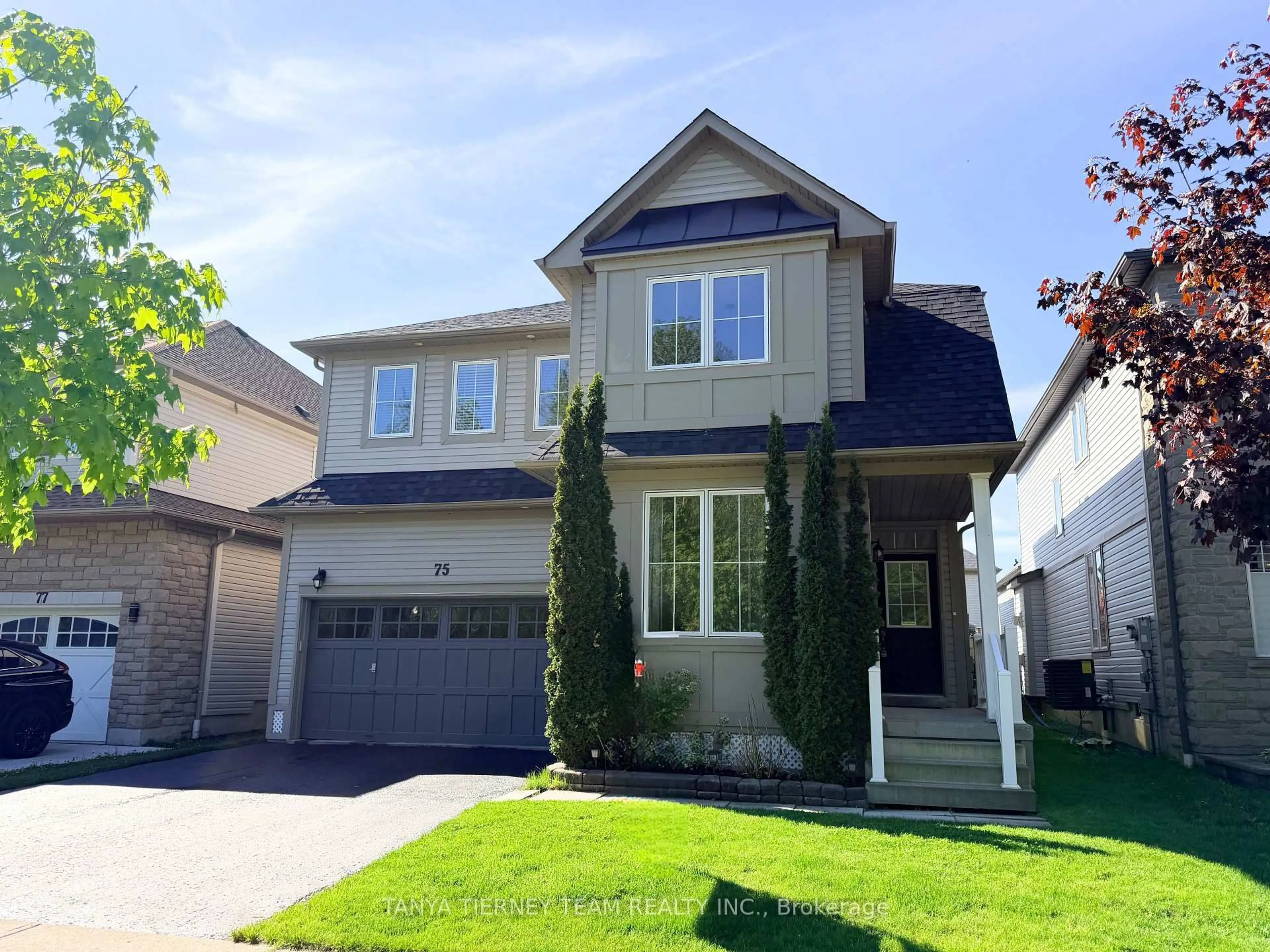 Home with vinyl exterior material, street for 75 Robert Attersley Dr, Whitby Ontario L1R 0B7