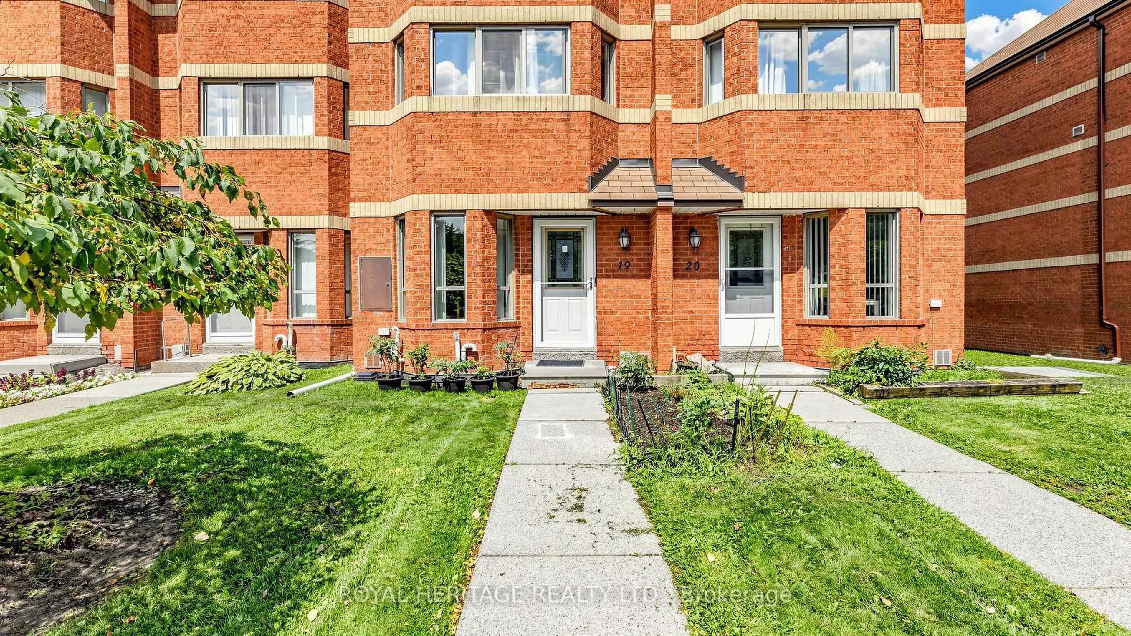 Home with brick exterior material, street for 2472 Eglinton Ave #Th 19, Toronto Ontario M1K 5J9
