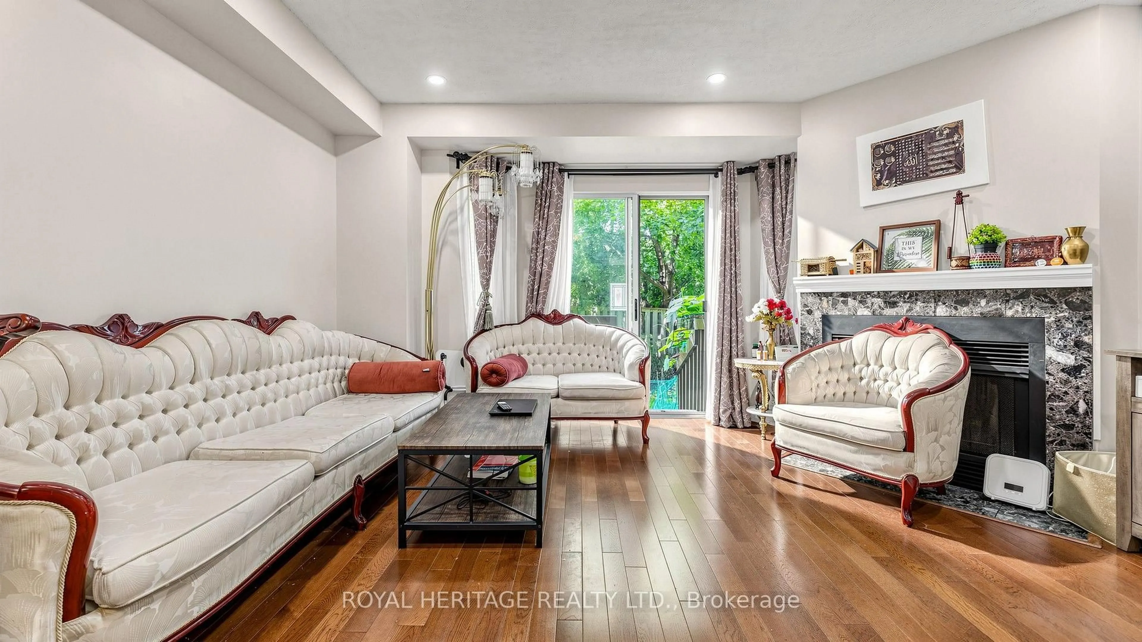 Living room with furniture, wood/laminate floor for 2472 Eglinton Ave #Th 19, Toronto Ontario M1K 5J9