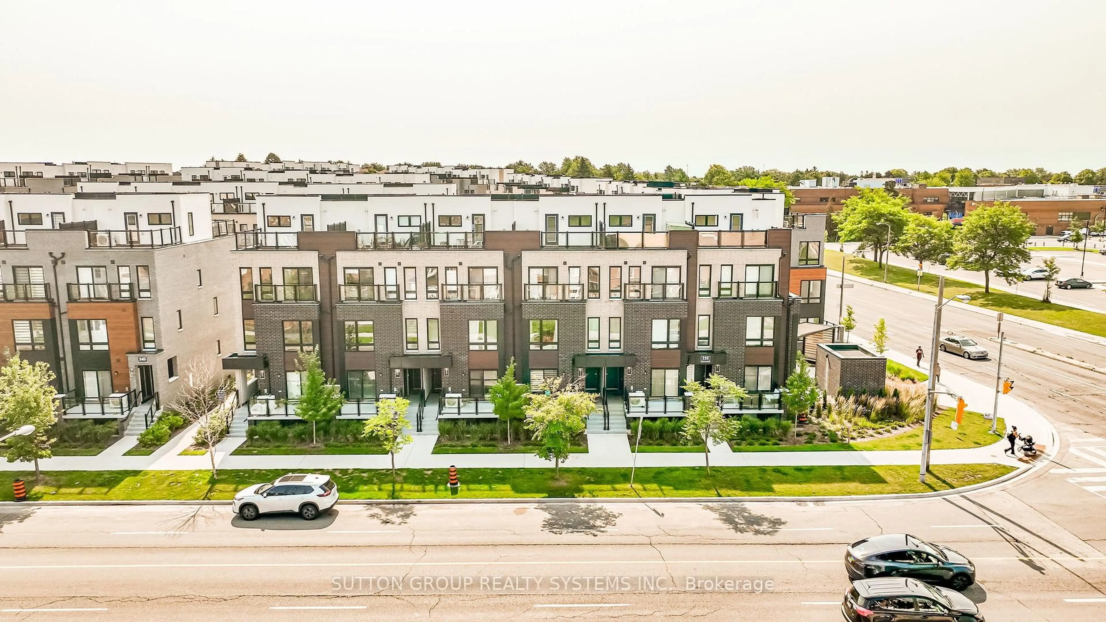 A pic from outside/outdoor area/front of a property/back of a property/a pic from drone, city buildings view from balcony for 235 McLevin Ave #11, Toronto Ontario M1B 0E8
