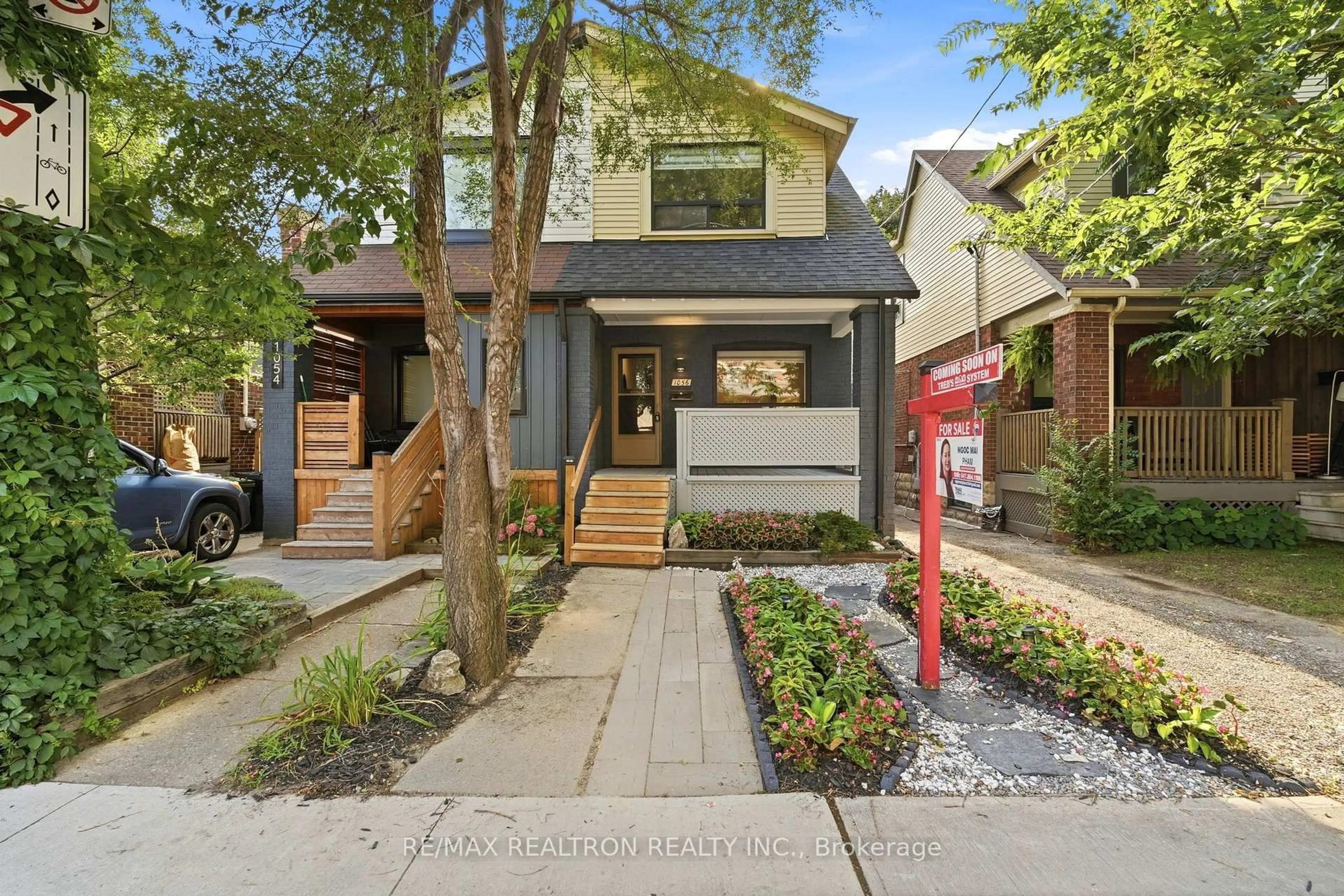 Home with brick exterior material, street for 1056 Woodbine Ave, Toronto Ontario M4C 4C5