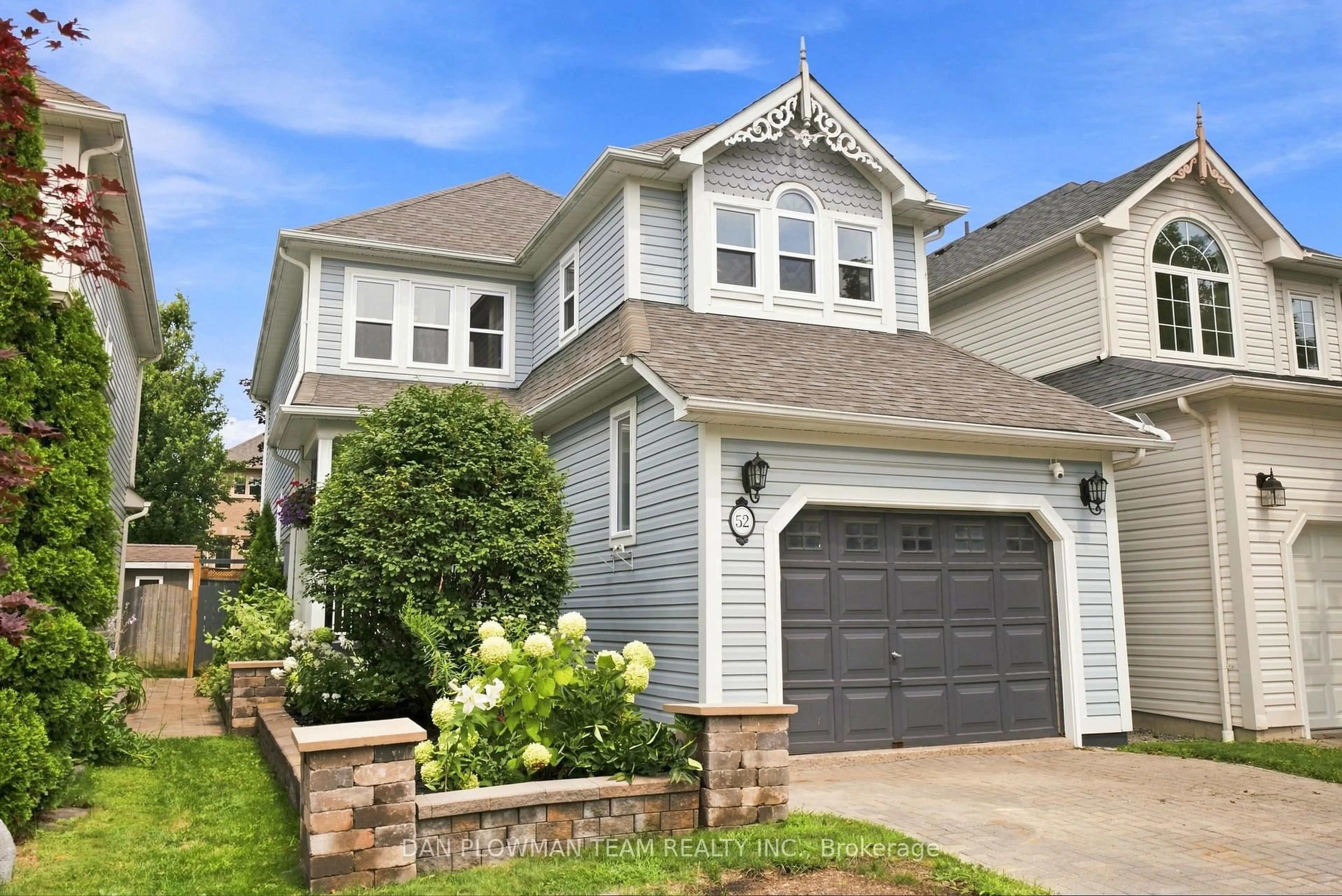 Home with vinyl exterior material, street for 52 Wells Cres, Whitby Ontario L1M 1C9