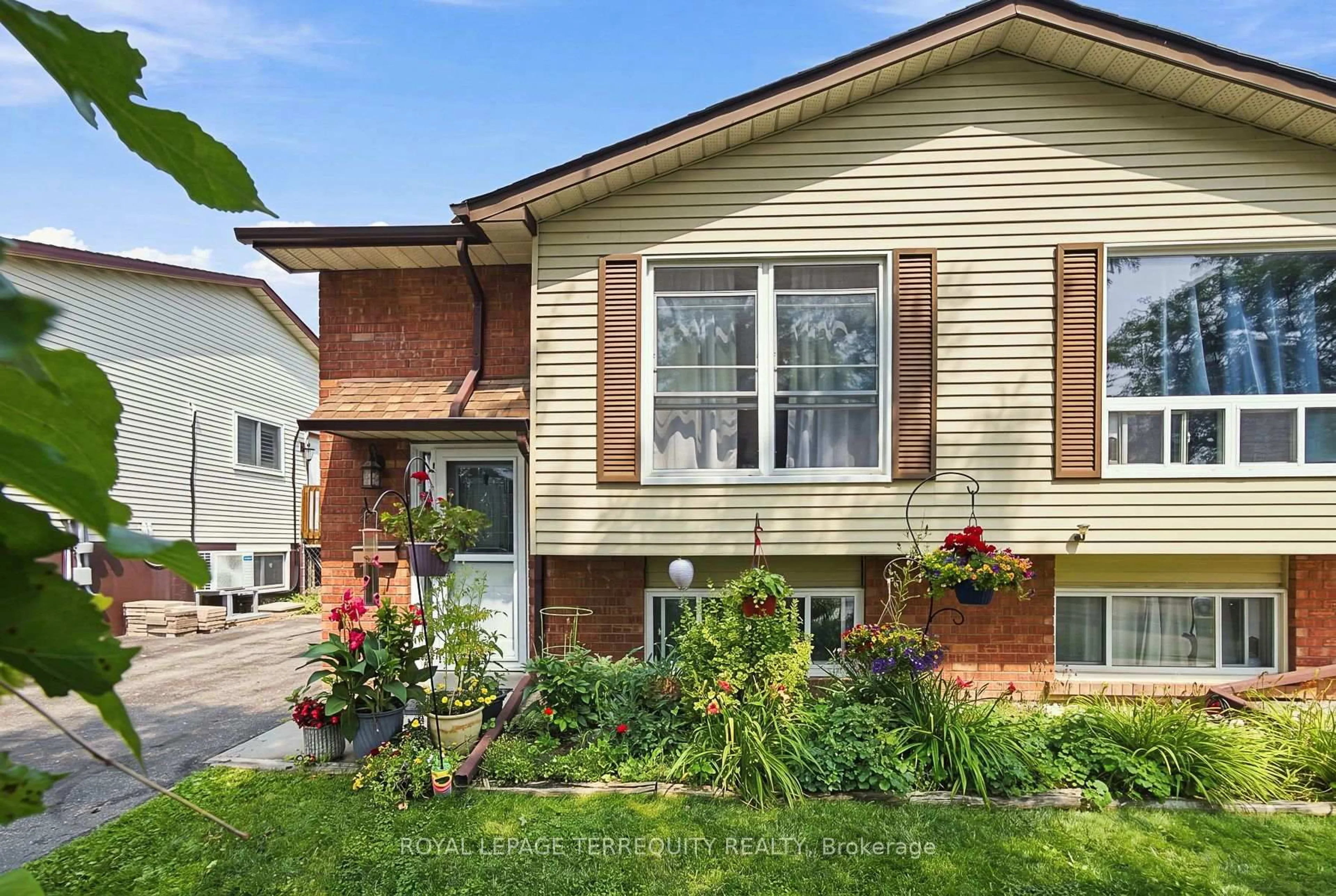 Home with brick exterior material, street for 224 Medina Crt, Oshawa Ontario L1J 7E1