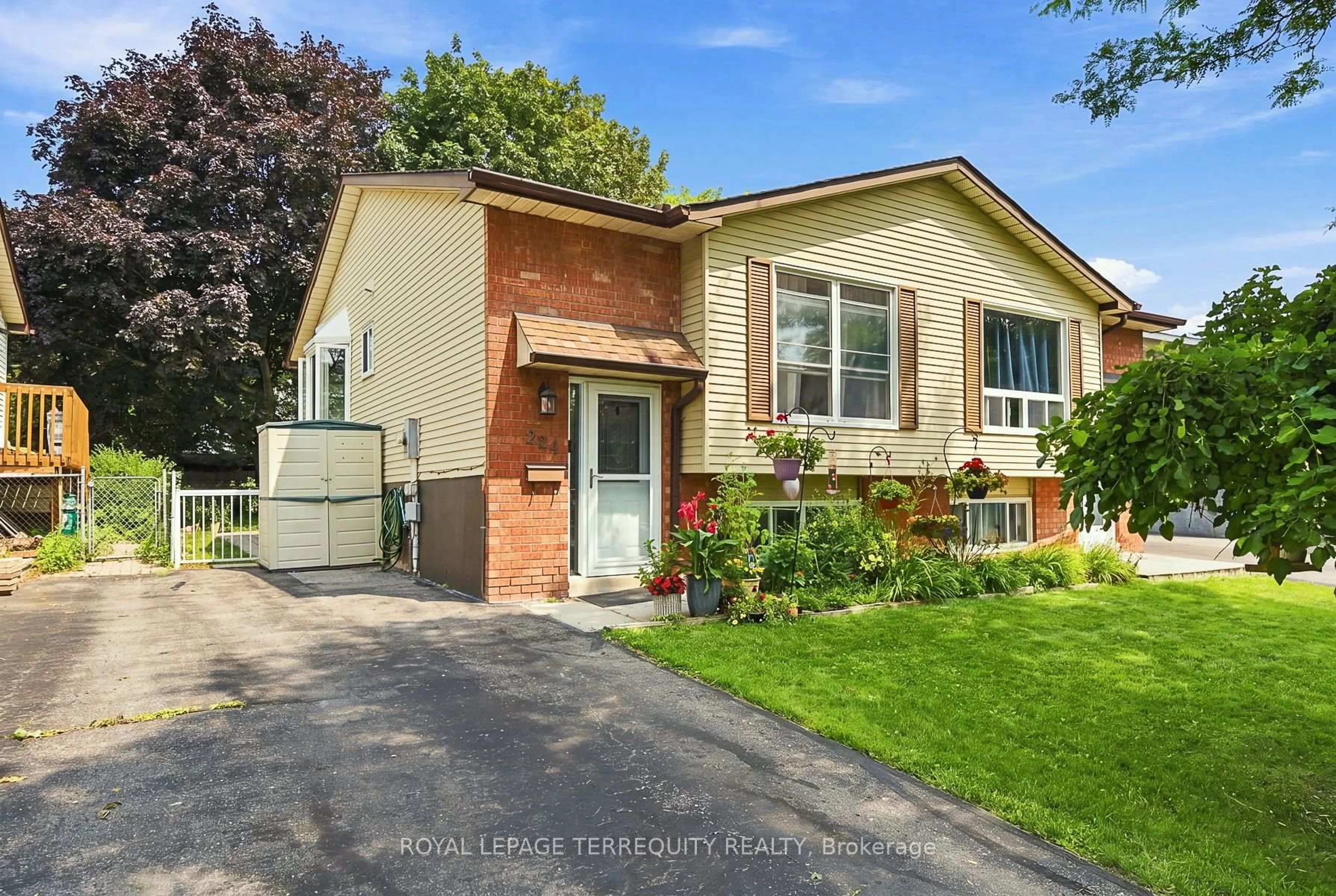 Home with brick exterior material, street for 224 Medina Crt, Oshawa Ontario L1J 7E1