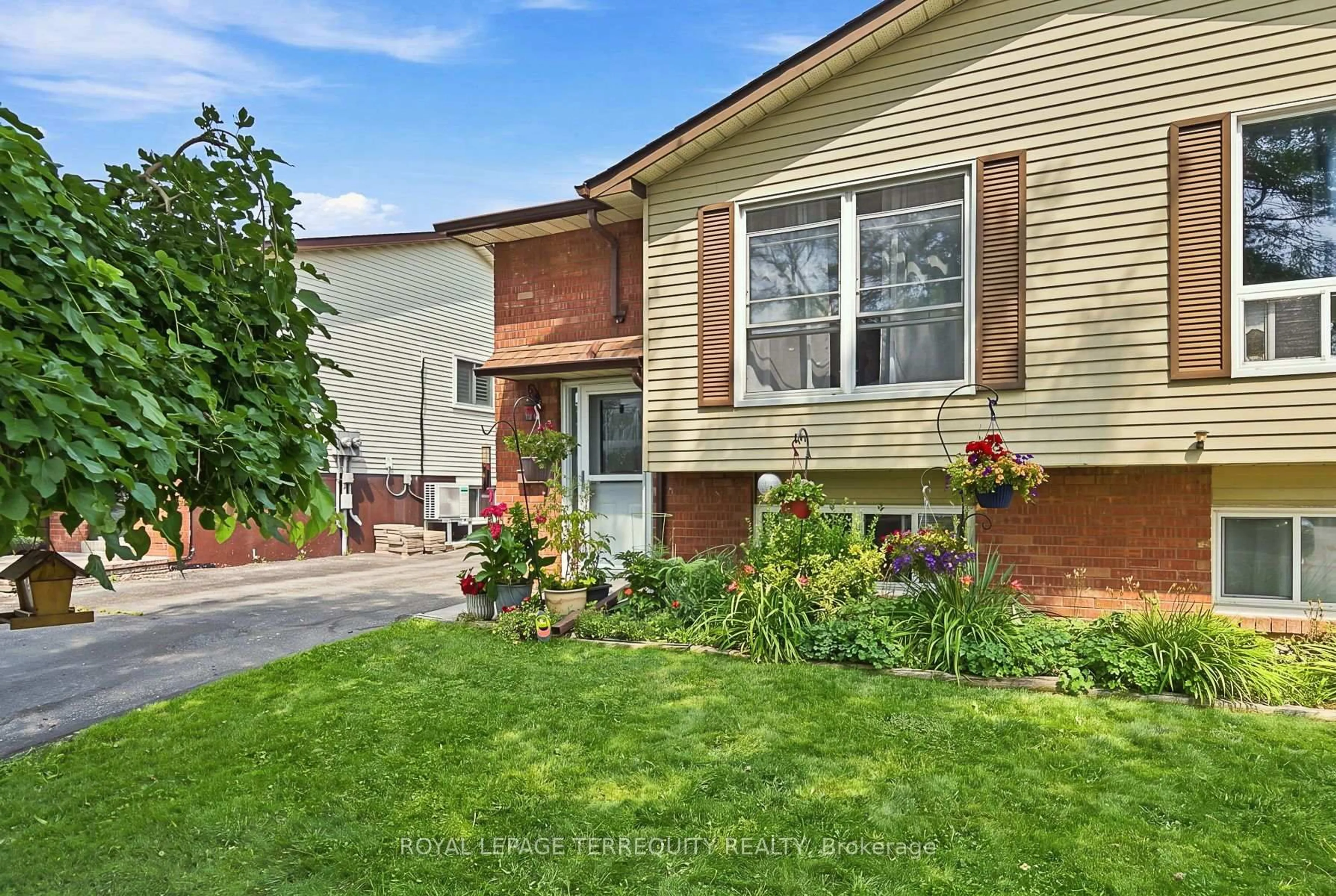 Home with brick exterior material, street for 224 Medina Crt, Oshawa Ontario L1J 7E1
