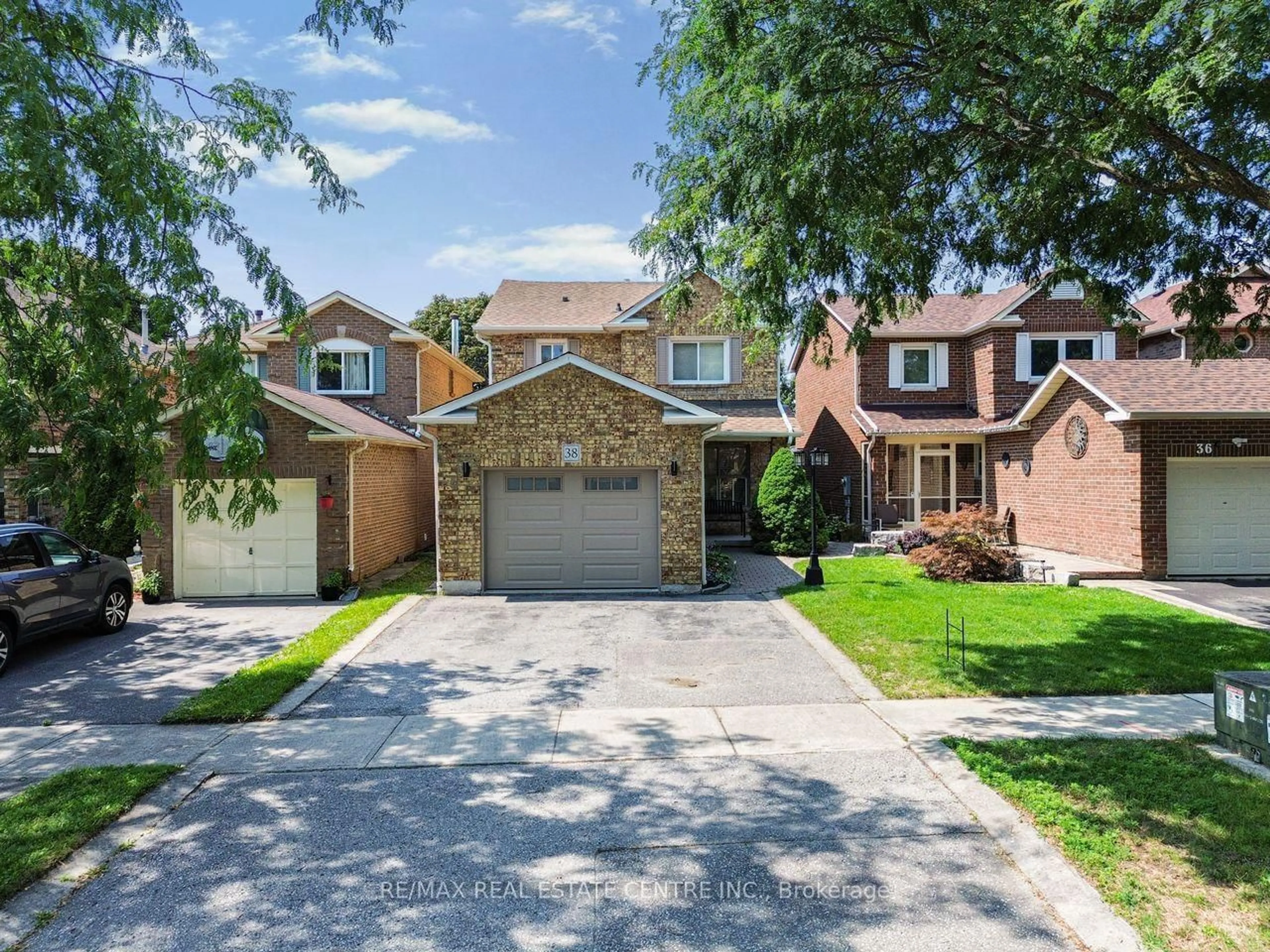 Home with brick exterior material, street for 38 Tresher Crt, Ajax Ontario L1T 2N1