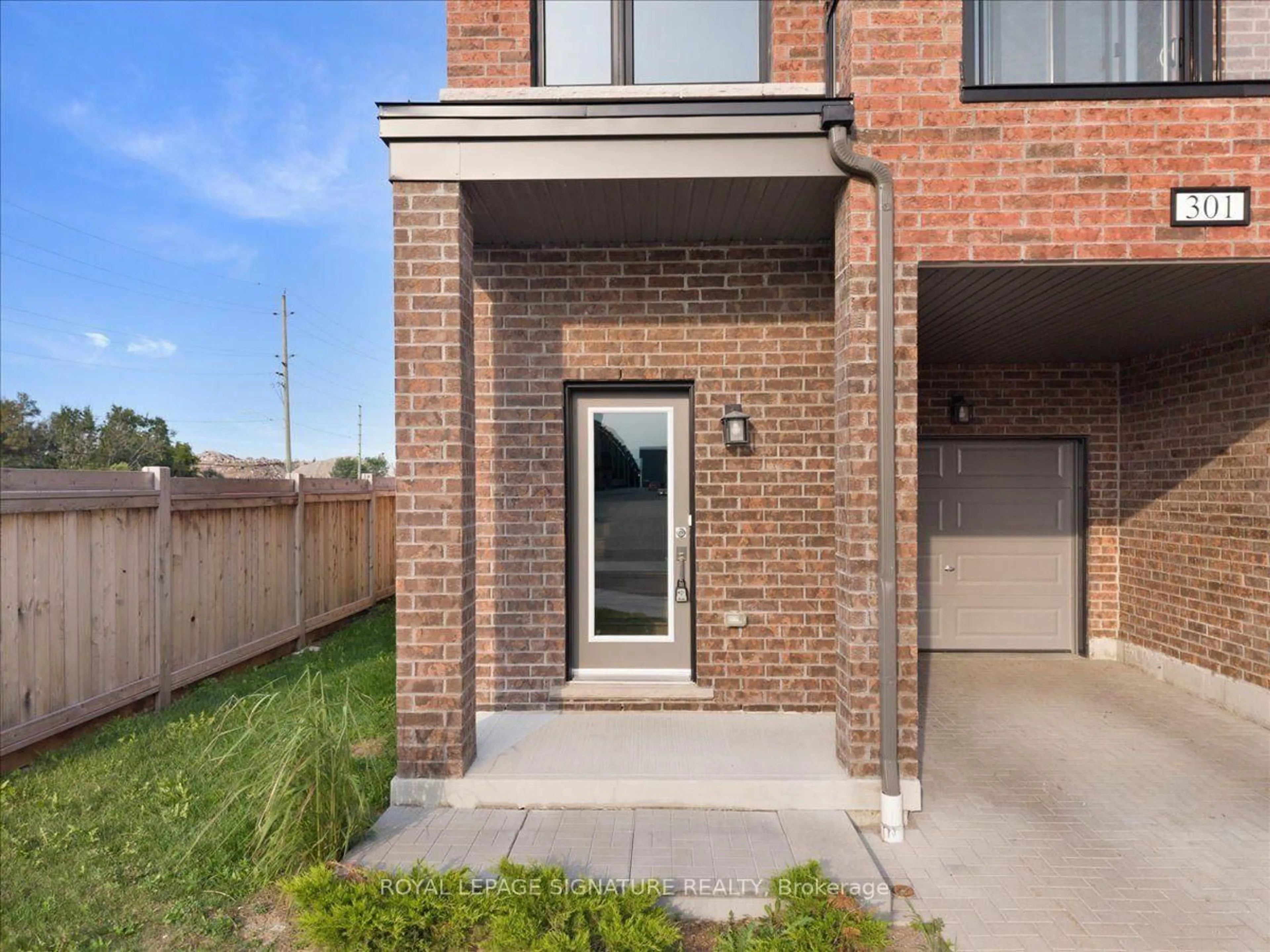 Home with brick exterior material, street for 1865 Pickering Pkwy #301, Pickering Ontario L1V 0H2