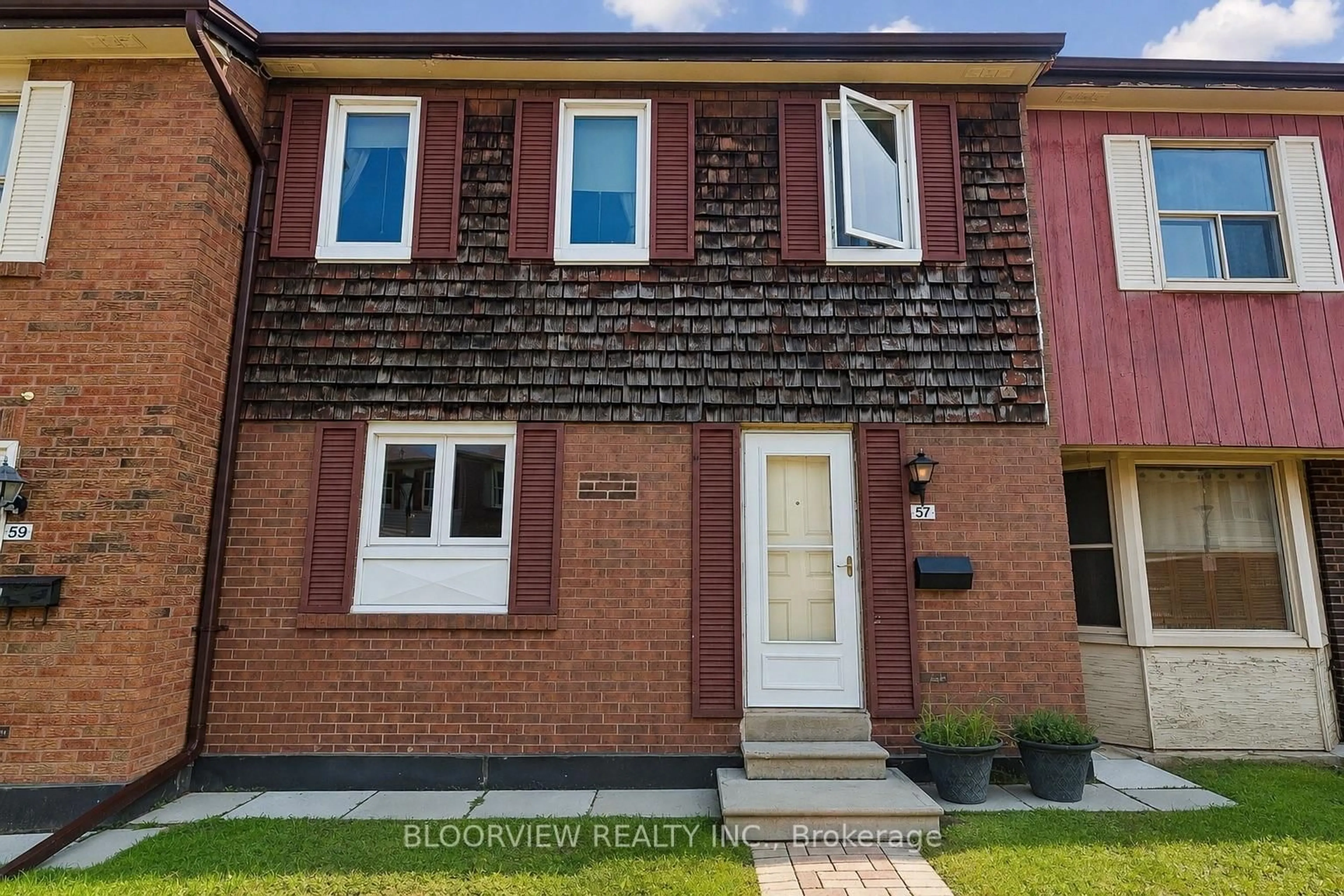 Home with brick exterior material, street for 20 Brimwood Blvd #57, Toronto Ontario M1V 1B7