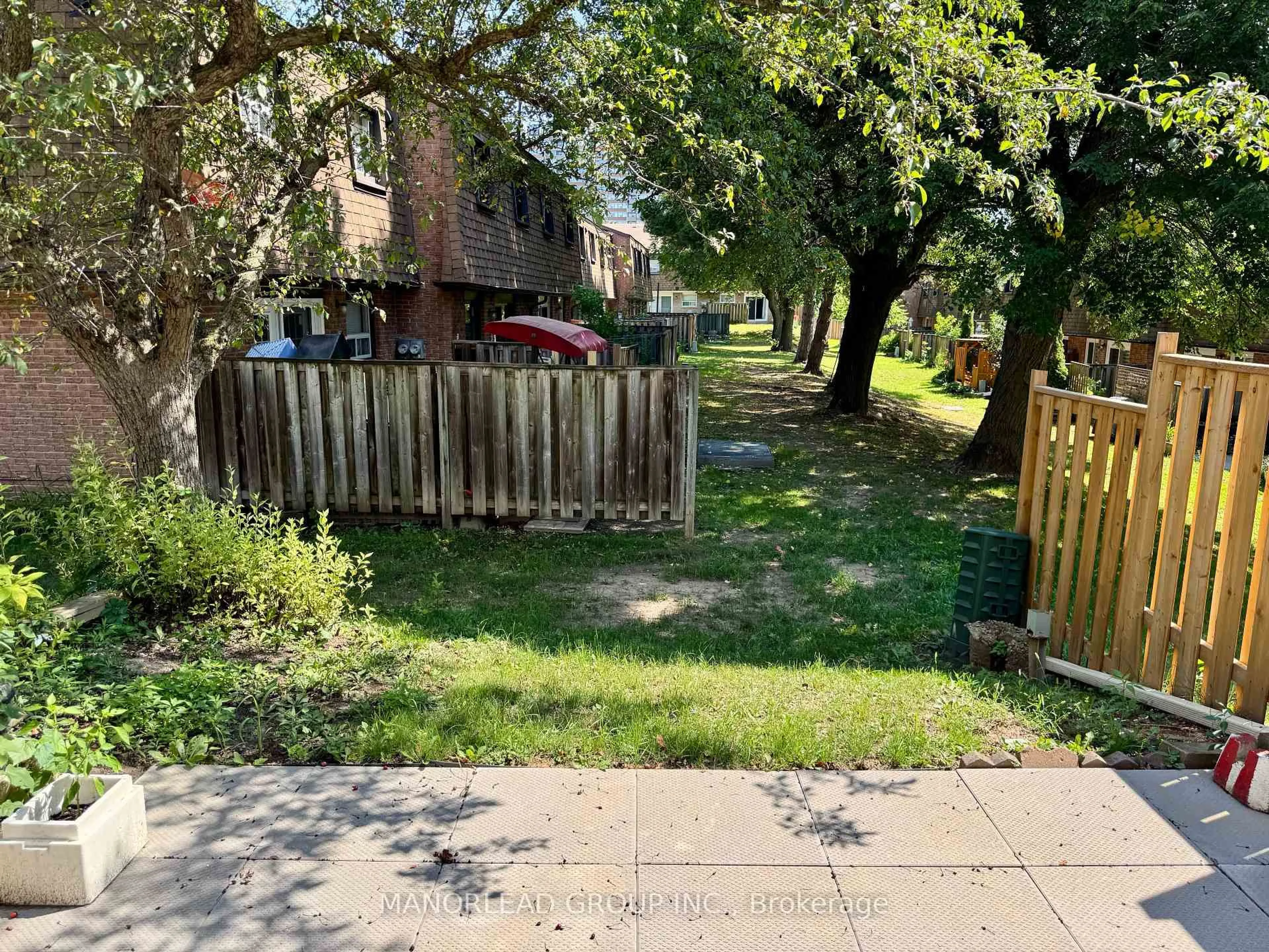 A pic from outside/outdoor area/front of a property/back of a property/a pic from drone, street for 121 L'Amoreaux Dr #31, Toronto Ontario M1W 2J9