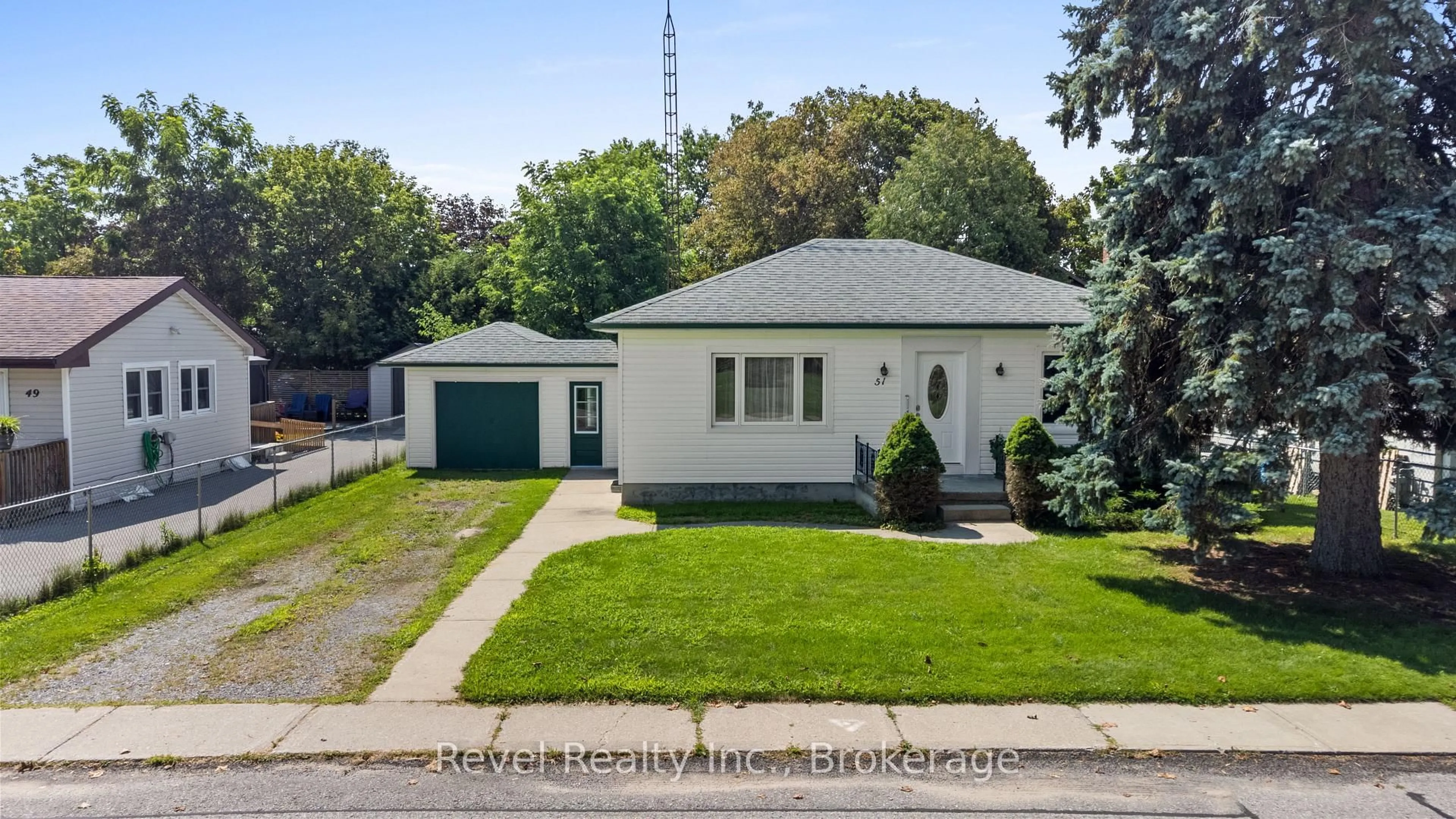 Home with vinyl exterior material, street for 51 Cobbledick St, Clarington Ontario L1B 1L9