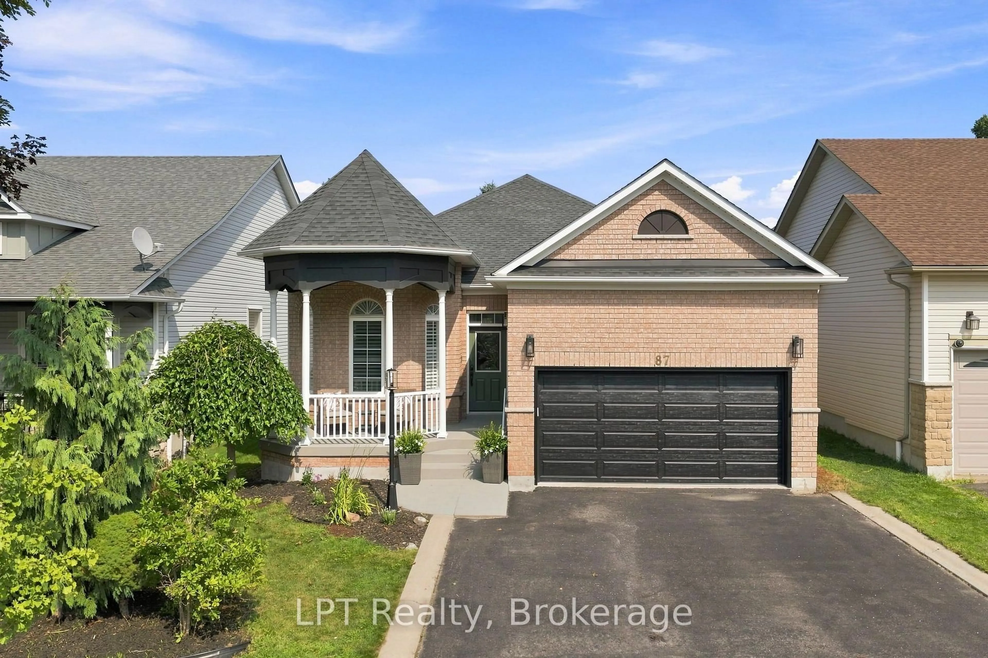 Home with brick exterior material, street for 87 Darius Harns Dr, Whitby Ontario L1M 2G2