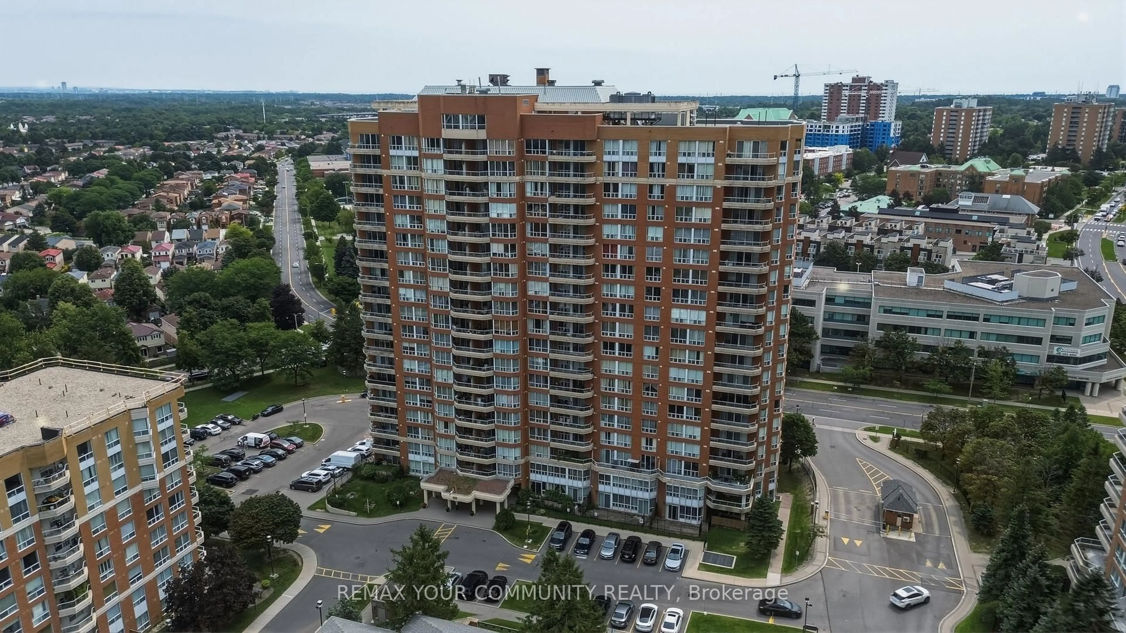 A pic from outside/outdoor area/front of a property/back of a property/a pic from drone, city buildings view from balcony for 410 McLevin Ave #103, Toronto Ontario M1B 5J5