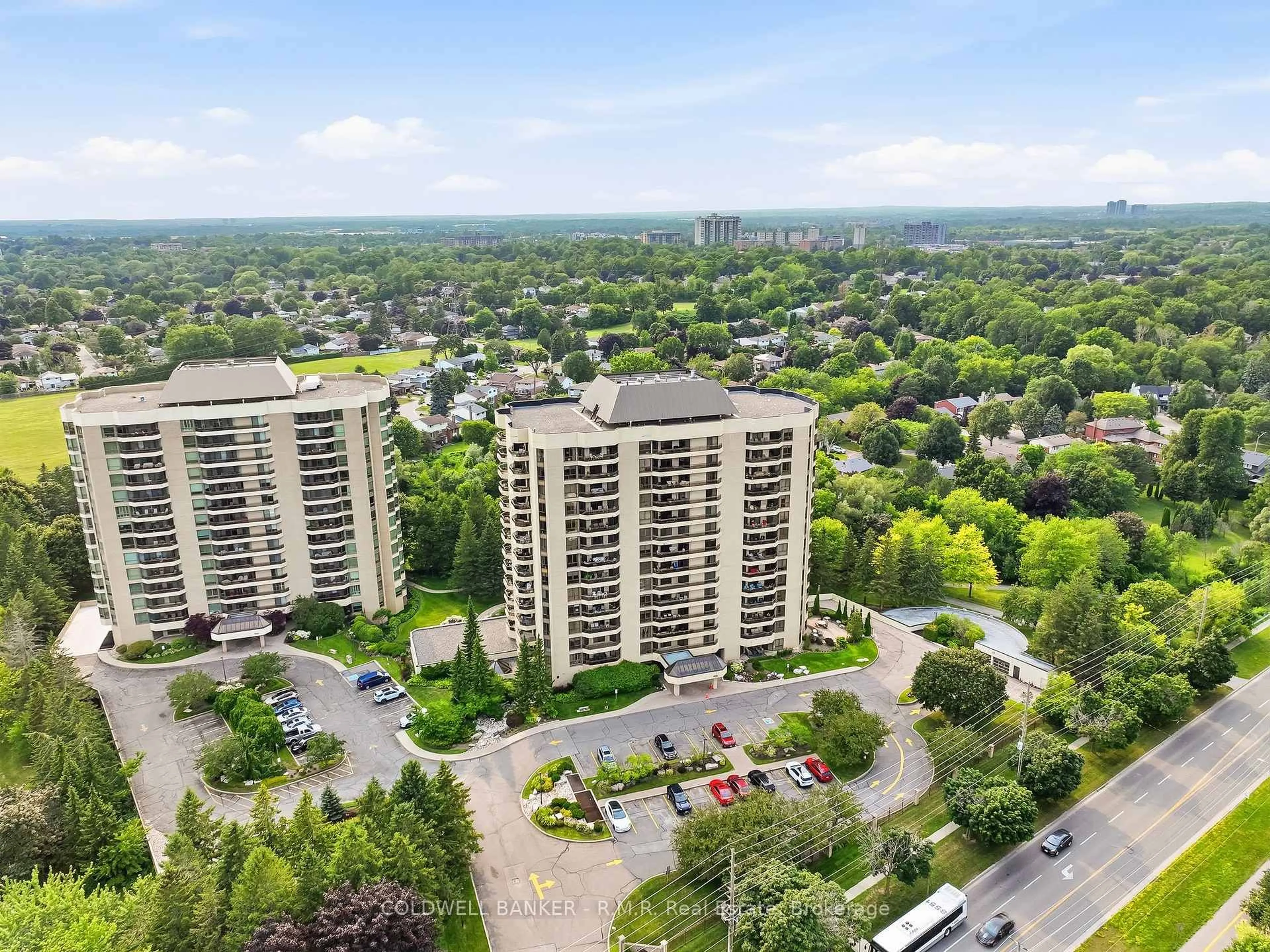 A pic from outside/outdoor area/front of a property/back of a property/a pic from drone, city buildings view from balcony for 900 Wilson Rd #305, Oshawa Ontario L1G 7T2