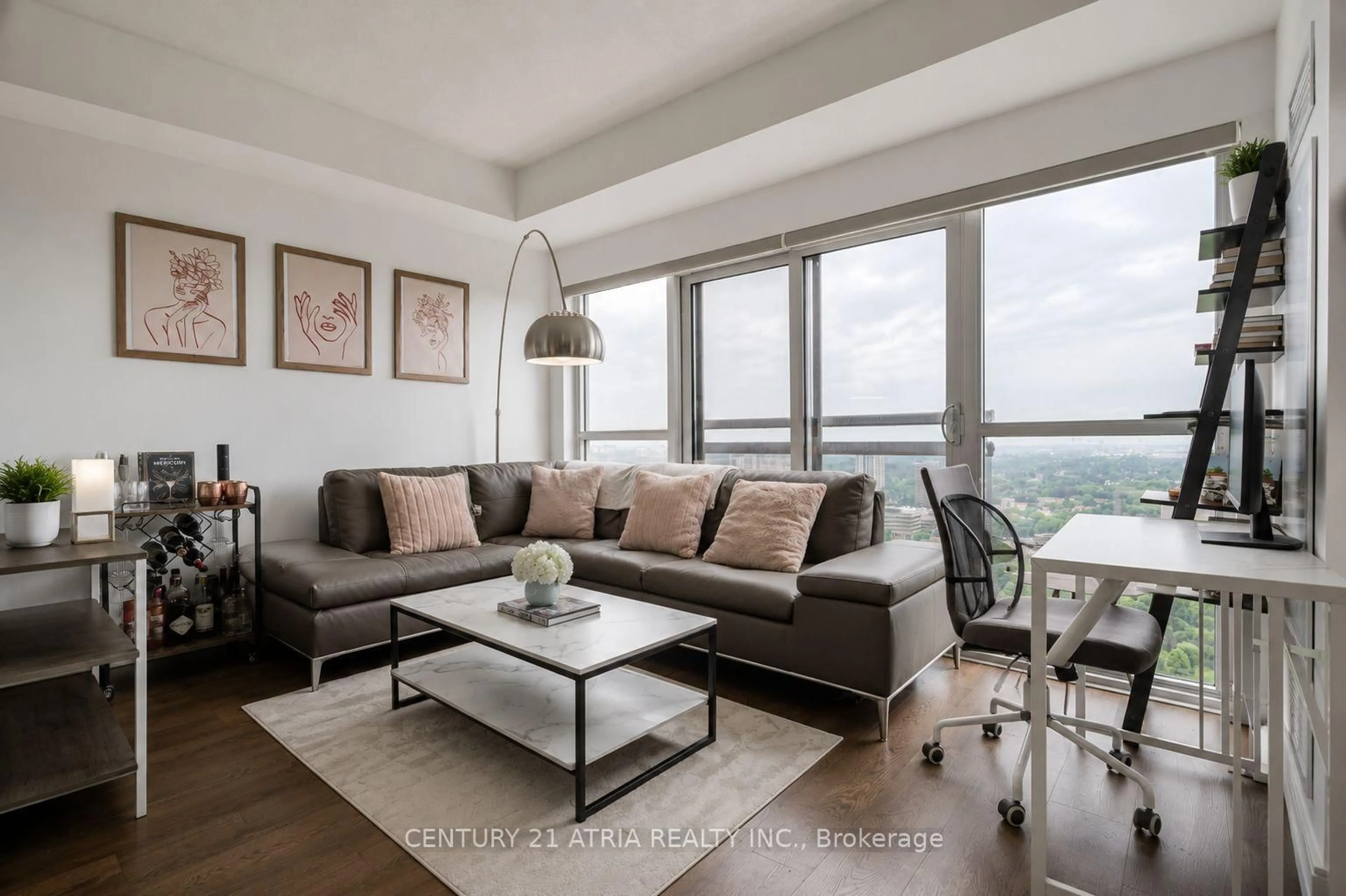 Living room with furniture, wood/laminate floor for 275 Village Green Sq #2919, Toronto Ontario M1S 0L8