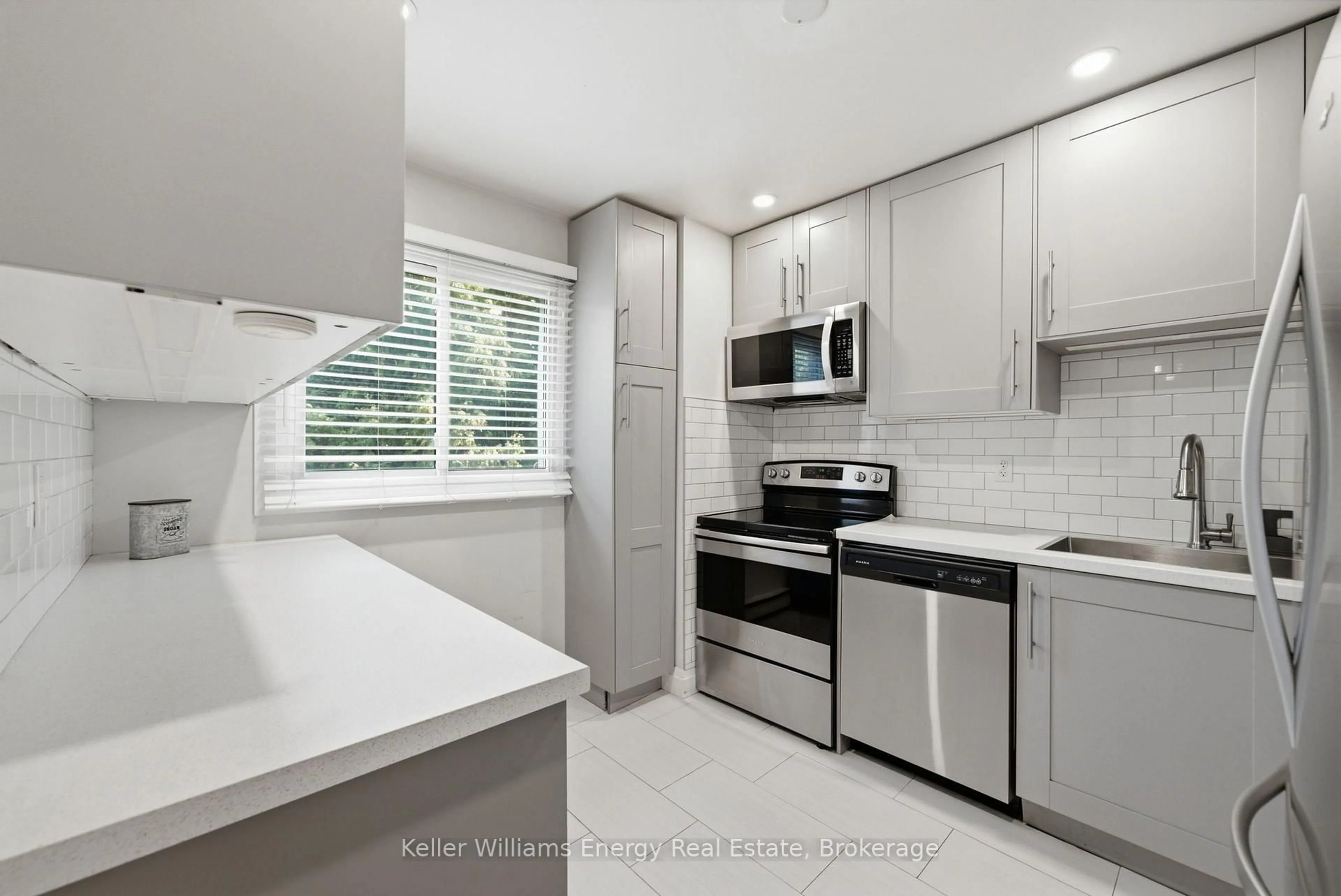 Standard kitchen, ceramic/tile floor for 700 Harmony Rd #105, Oshawa Ontario L1K 1S2