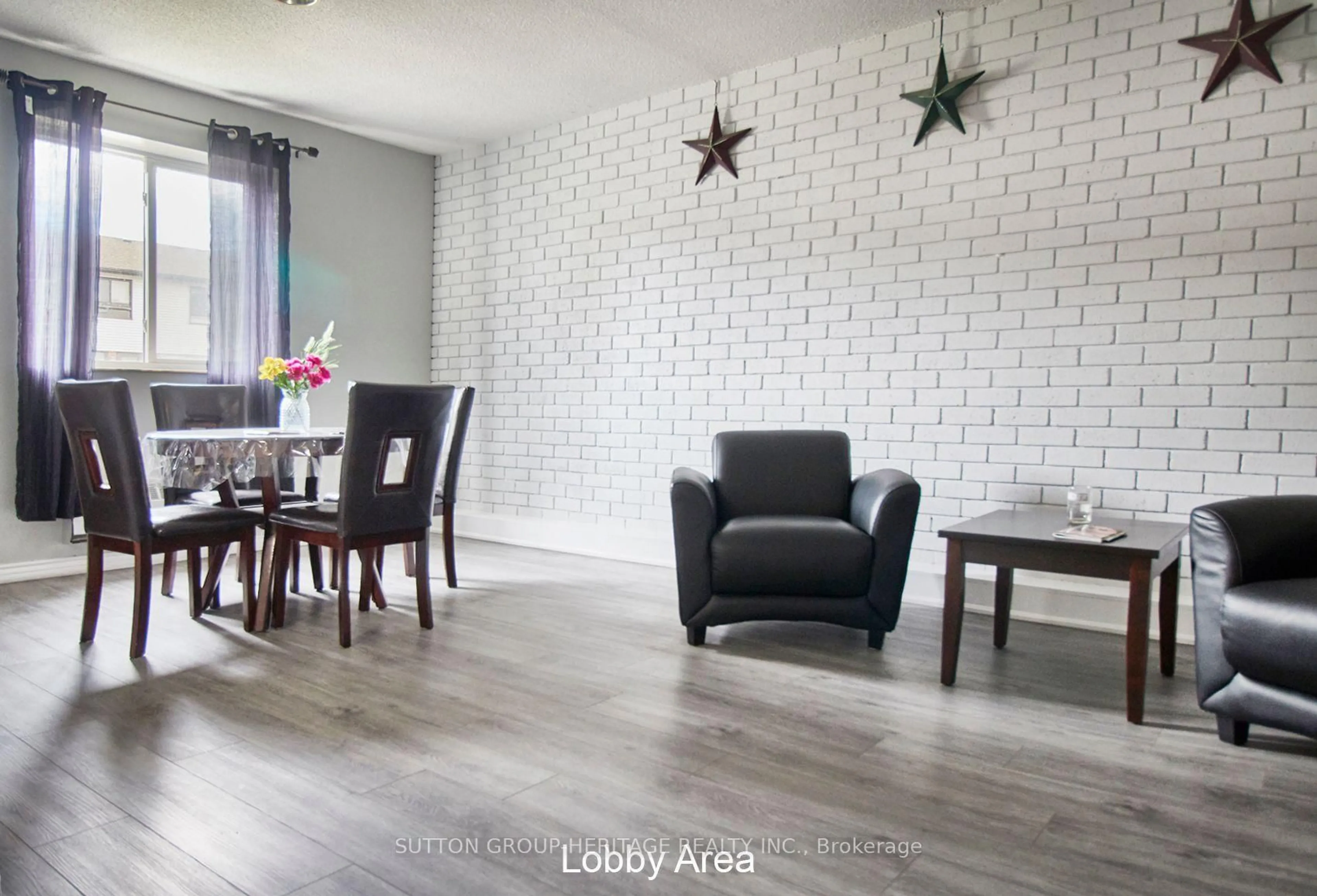 Living room with furniture, wood/laminate floor for 936 Glen St #301, Oshawa Ontario L1J 5Z7
