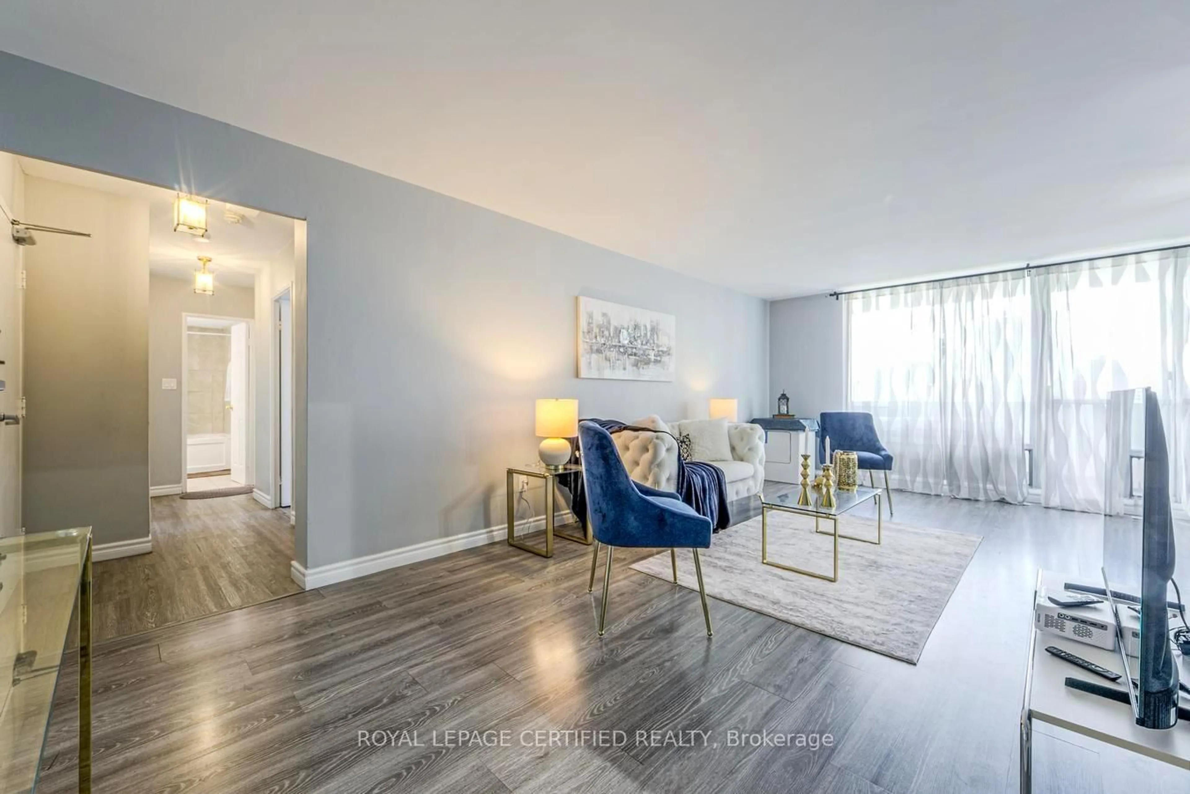 Living room with furniture, unknown for 1 Massey Sq #1208, Toronto Ontario M4C 5L4