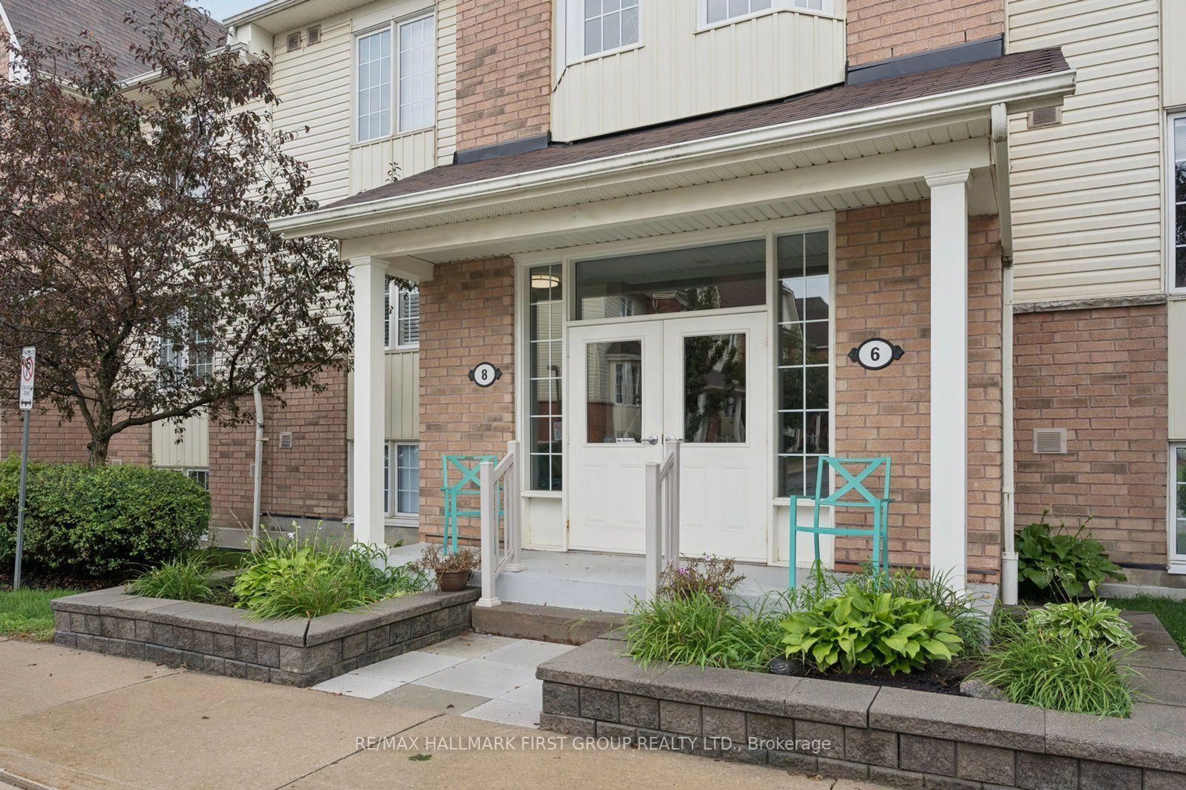 Home with brick exterior material, street for 8 Petra Way #2, Whitby Ontario L1R 0A6